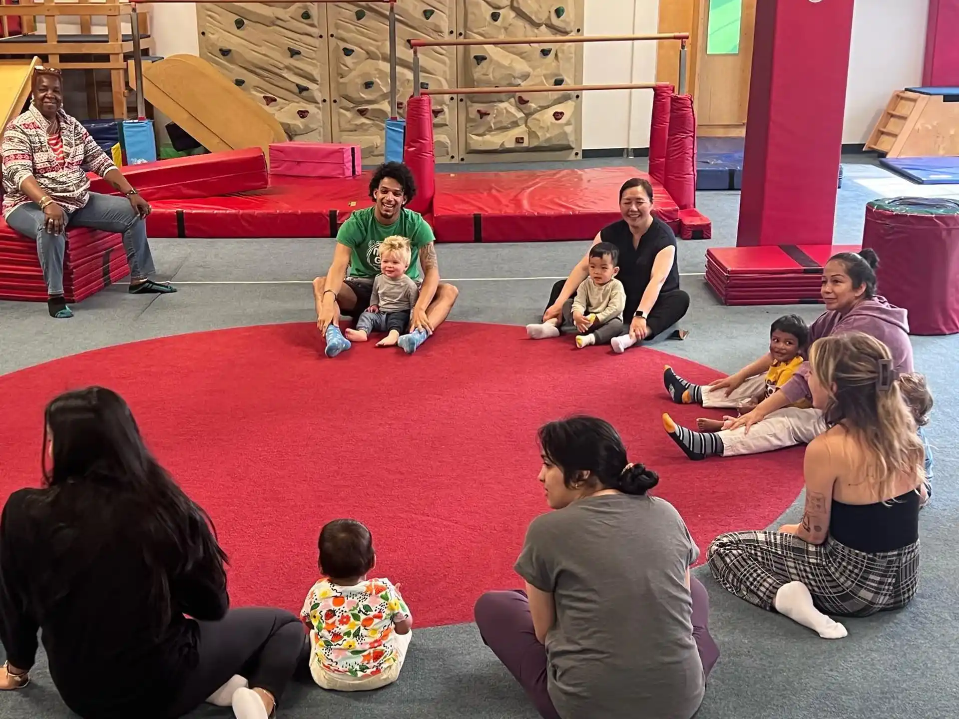 a group of people sitting on the floor
