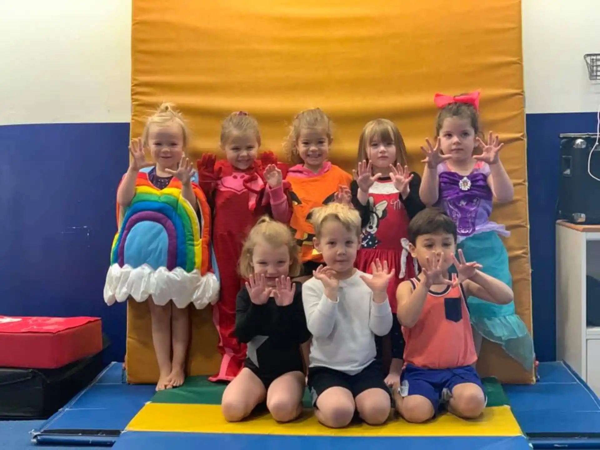 a group of children posing for a photo
