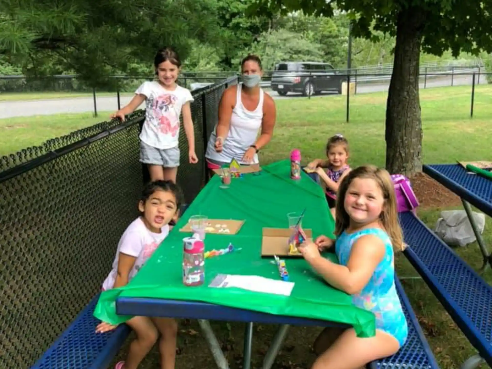a group of people around a table