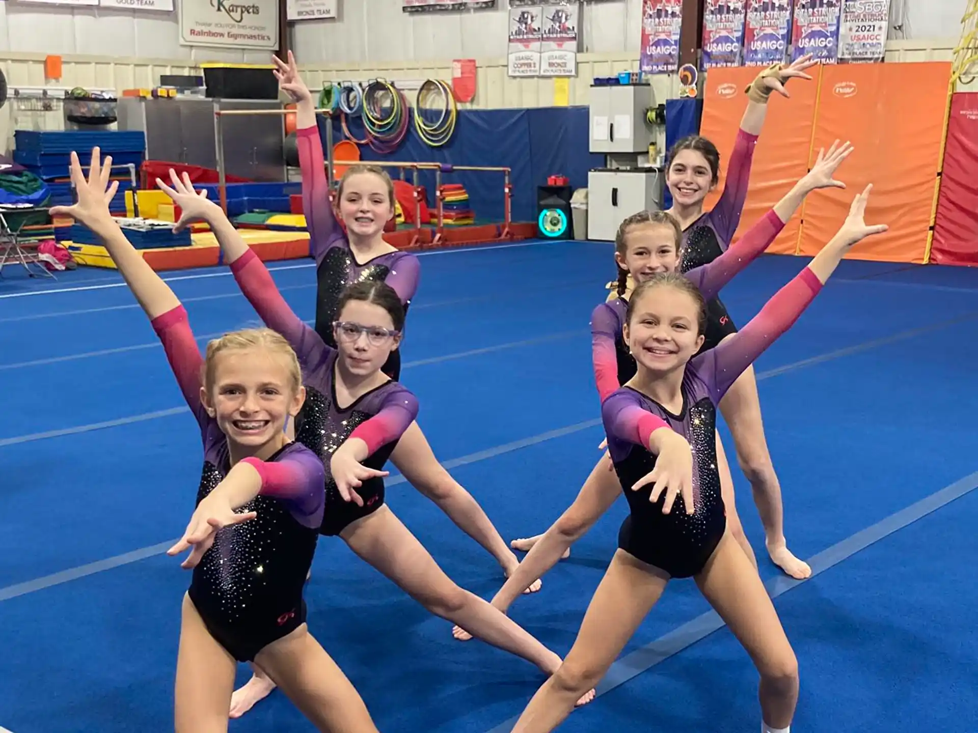 a group of girls in a gym