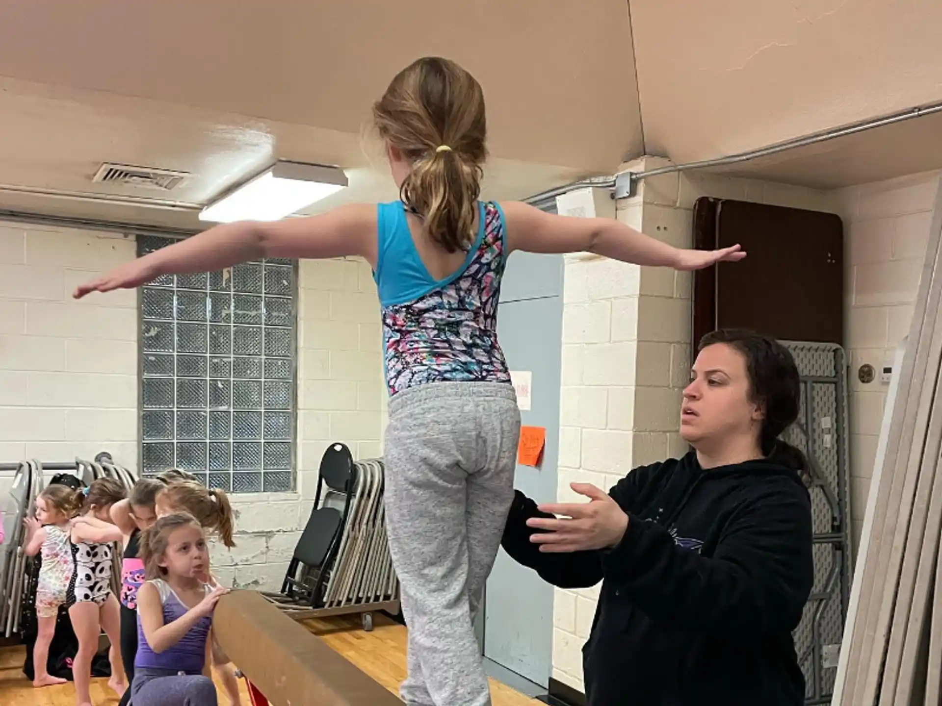 a person standing on a person's back