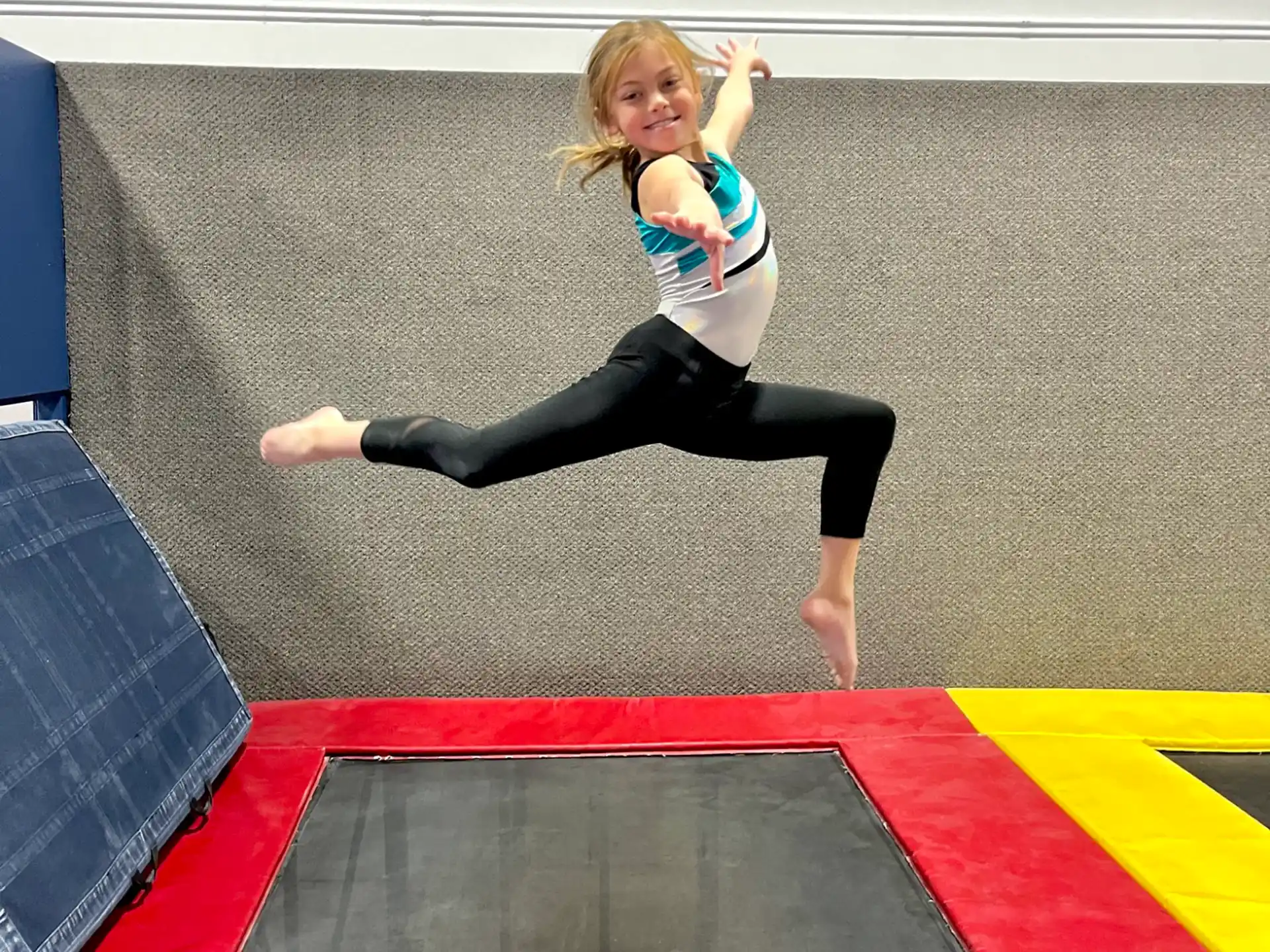 a girl doing a yoga pose
