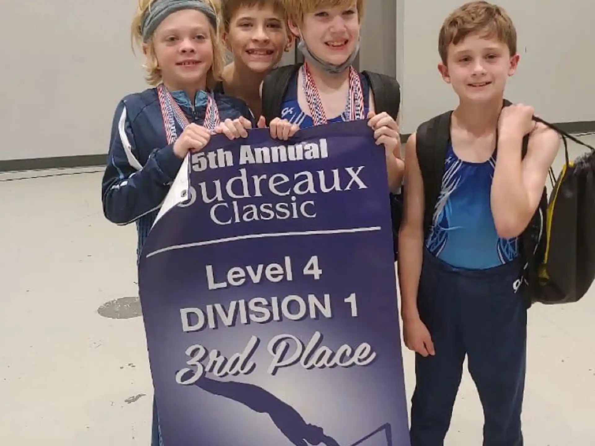 a group of children holding a sign