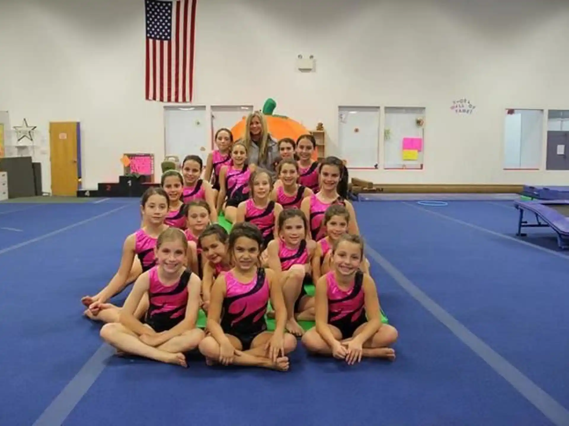 a group of girls in a gym