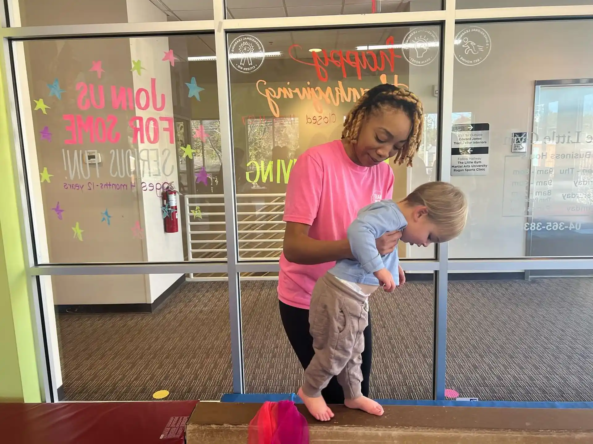 a person holding a child