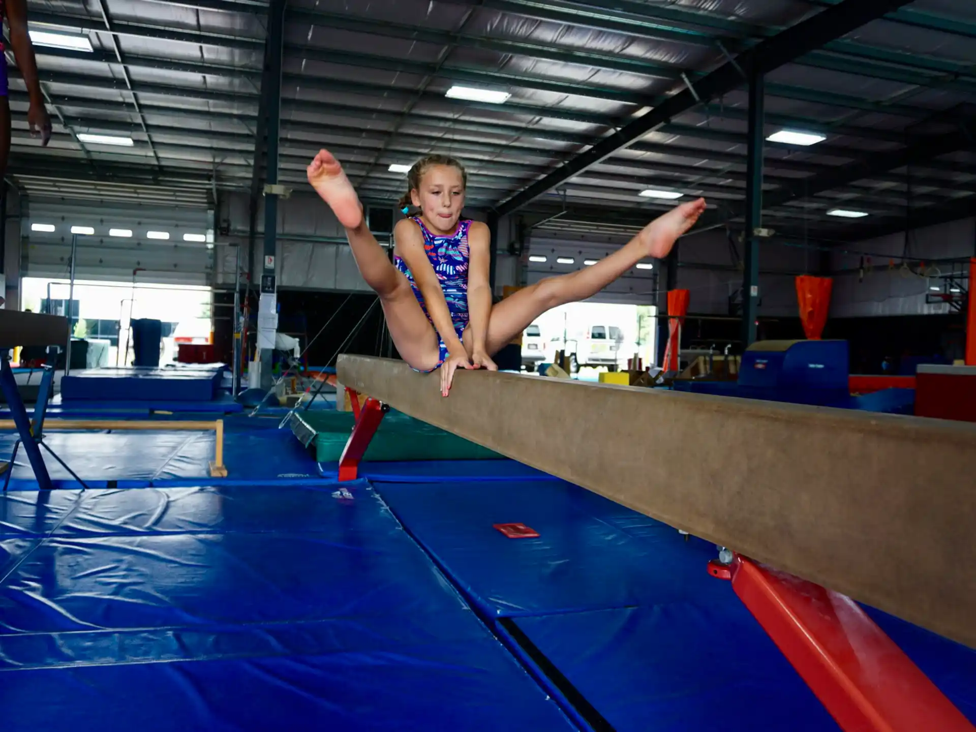 a man jumping on a trampoline