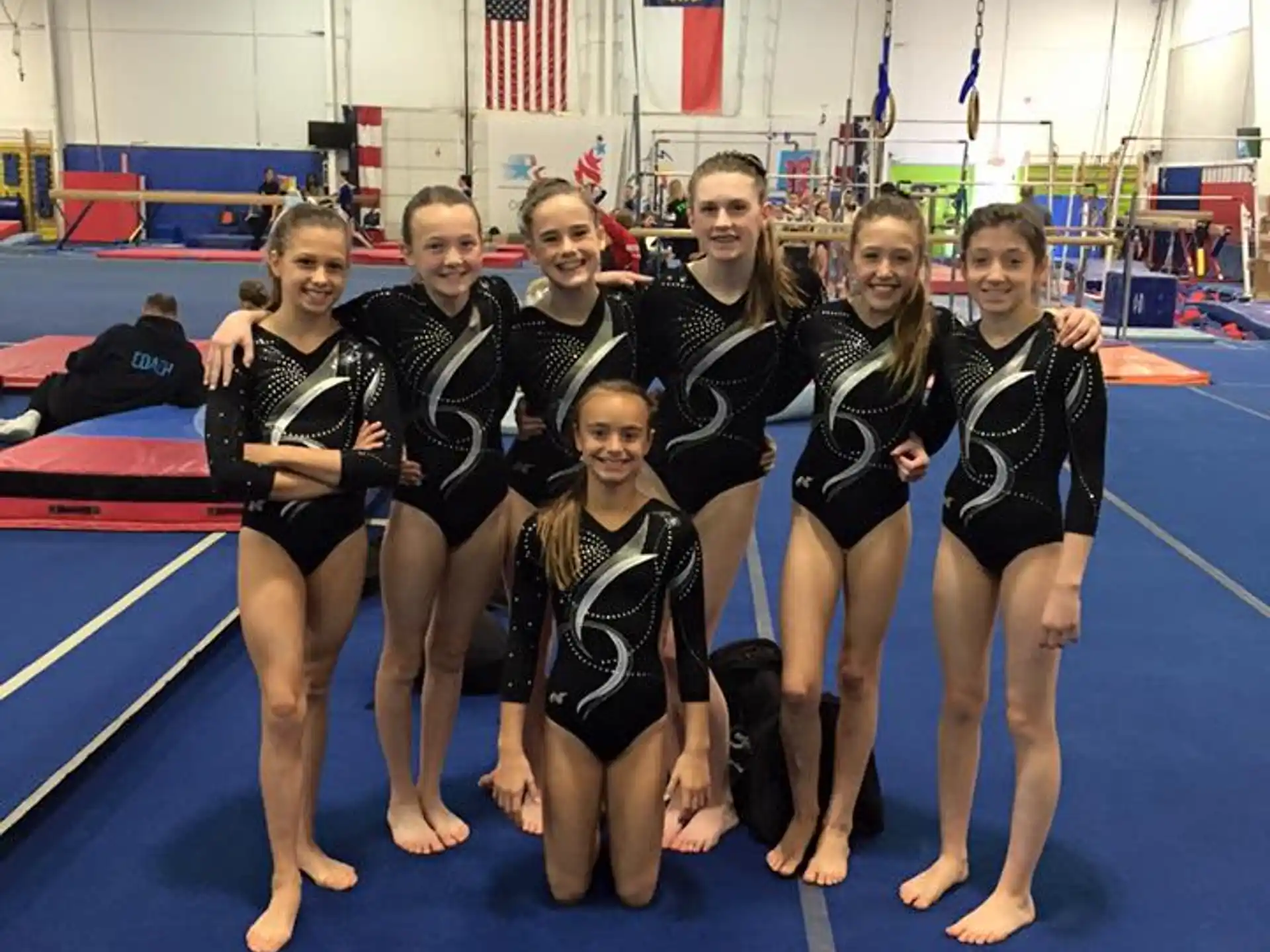 a group of women in a gym