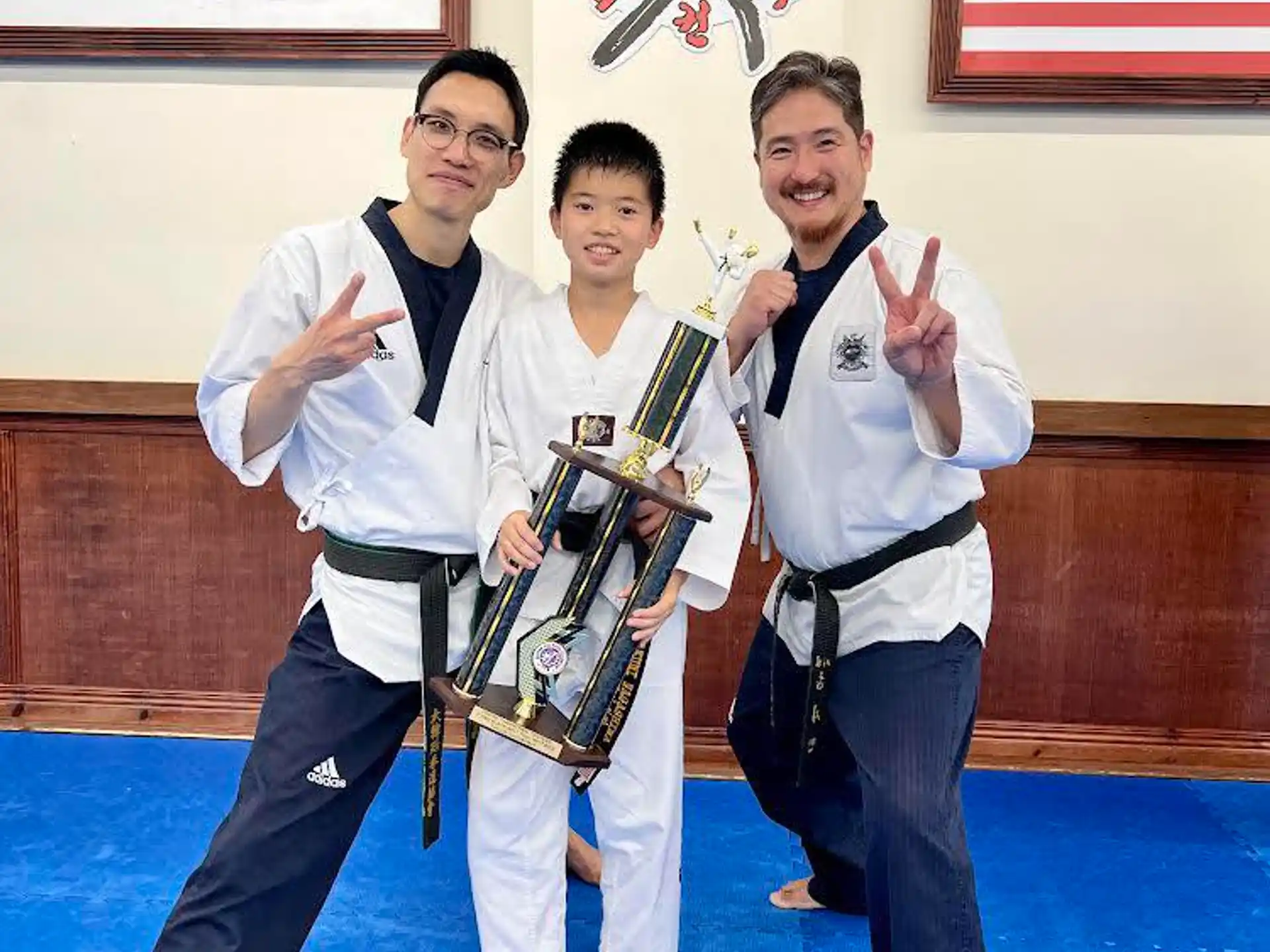 a group of men in karate uniforms