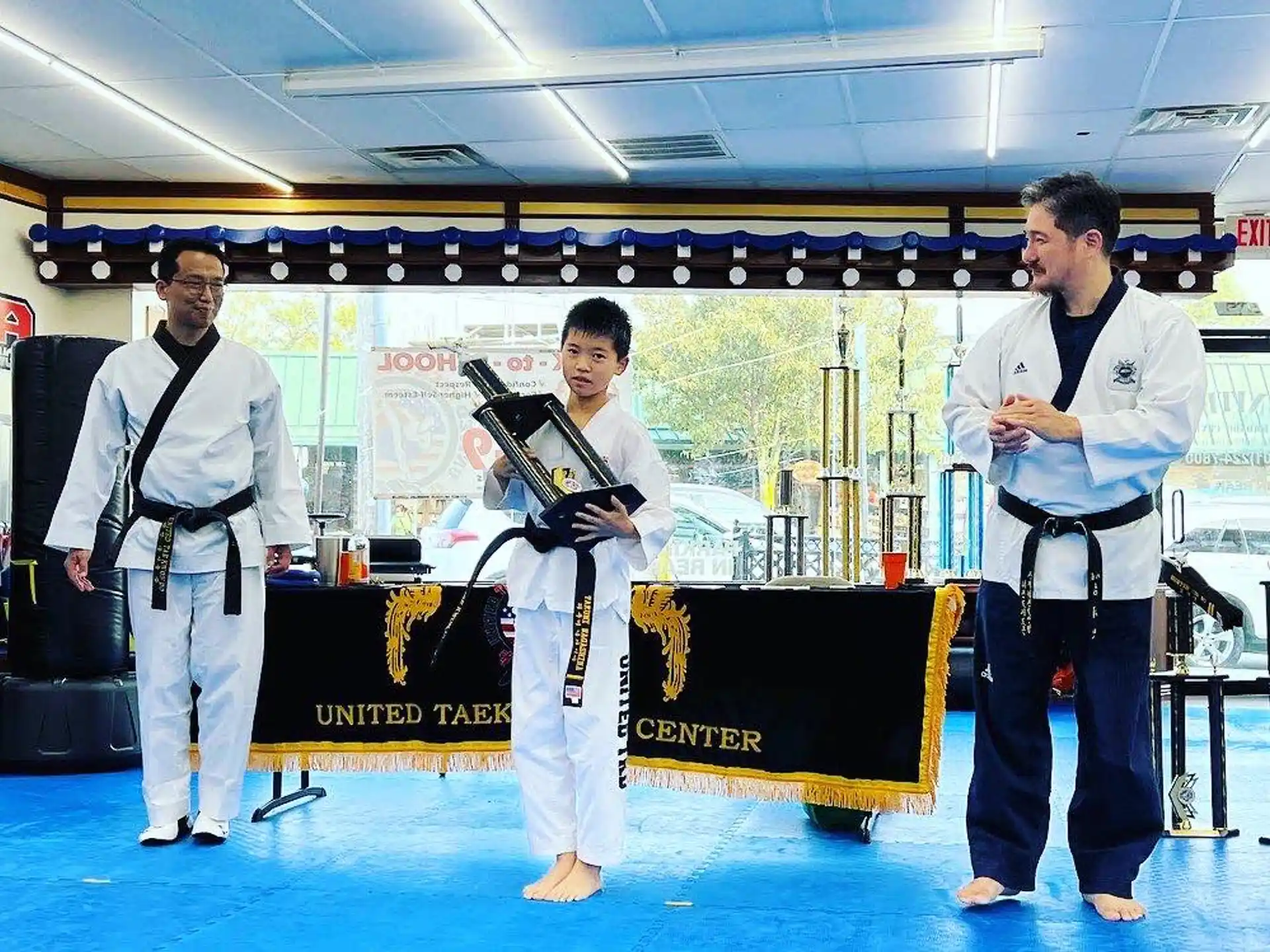 a group of people in karate uniforms