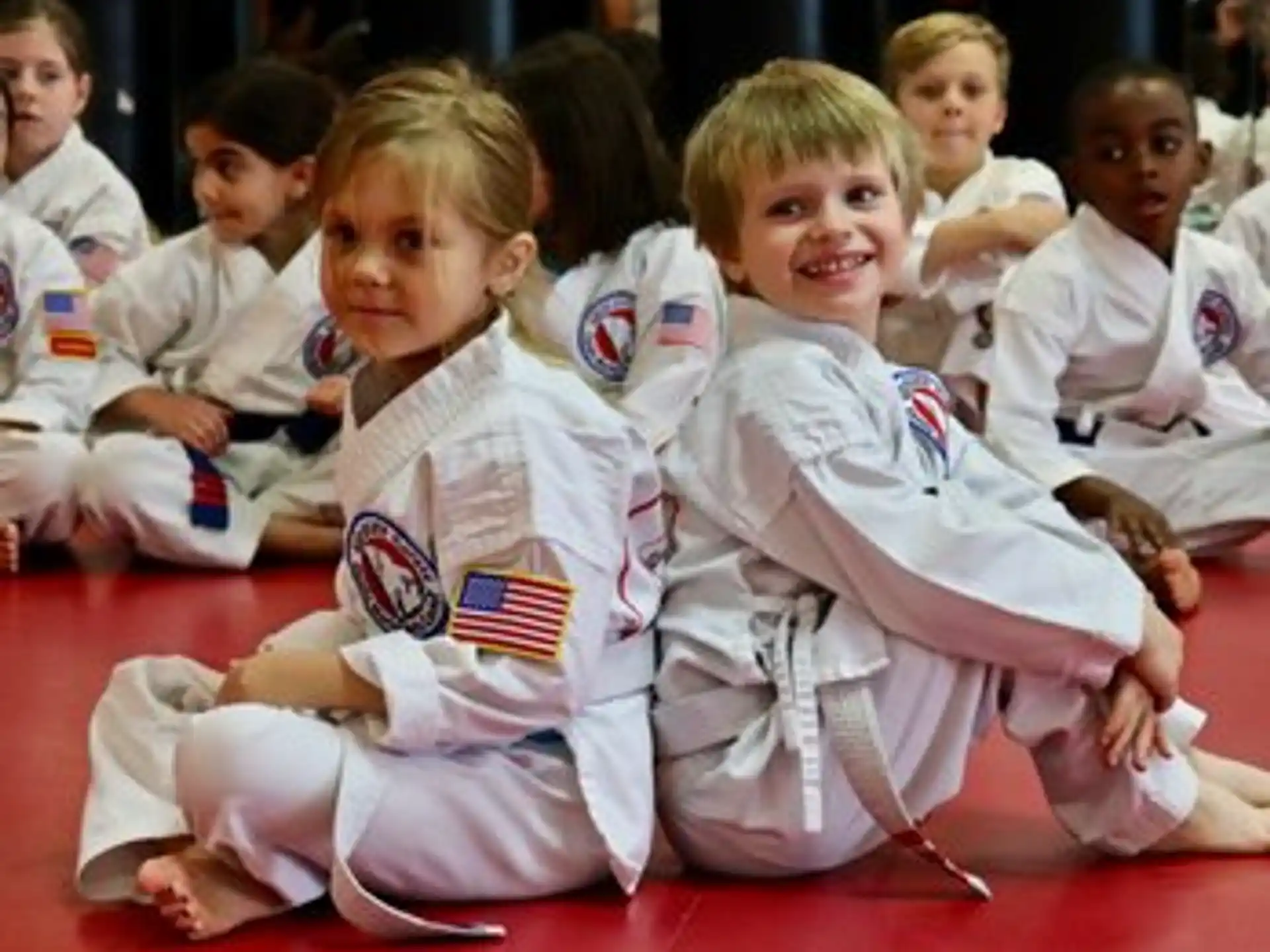 a group of children sitting on the floor