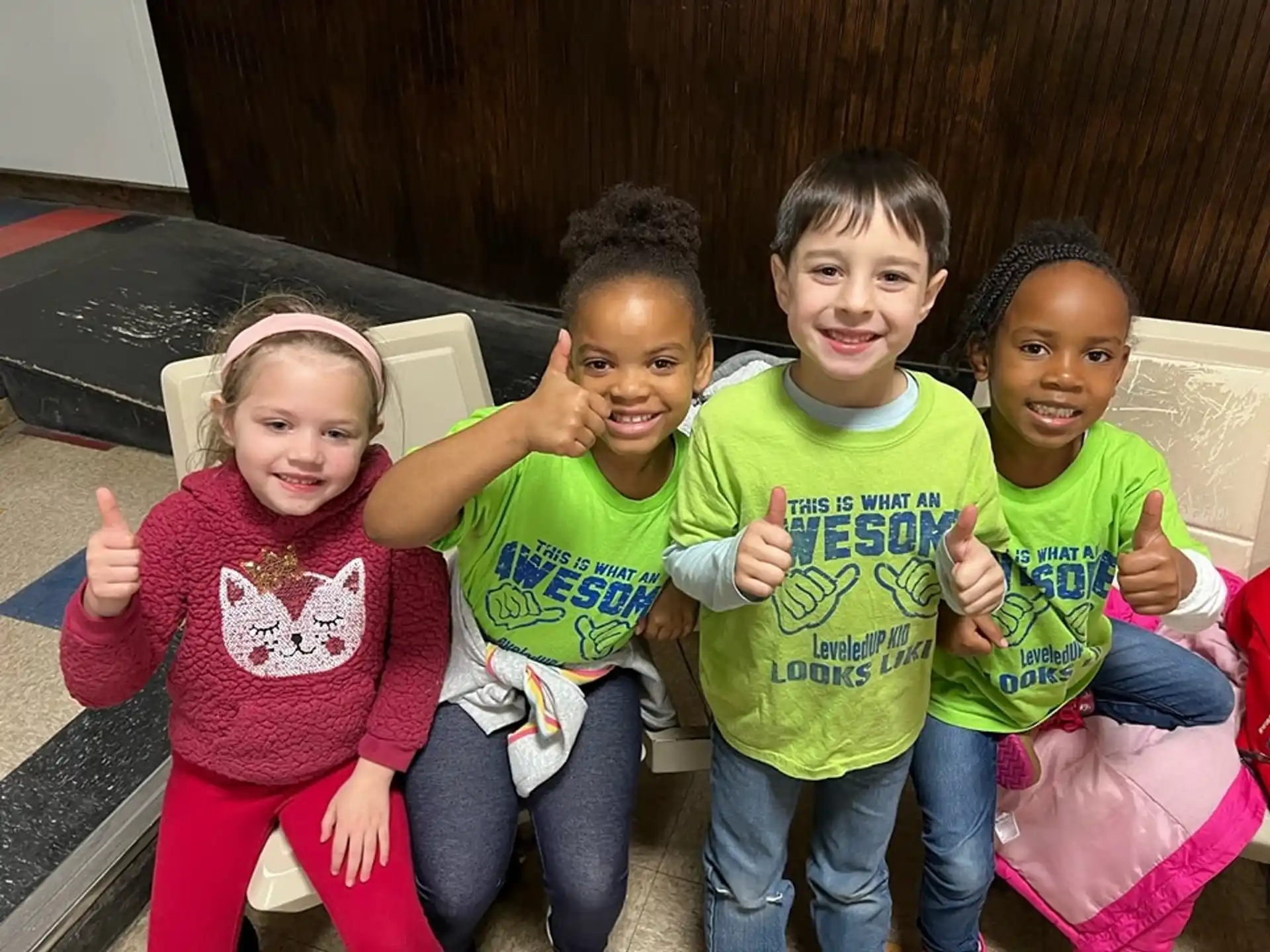 a group of children posing for a photo