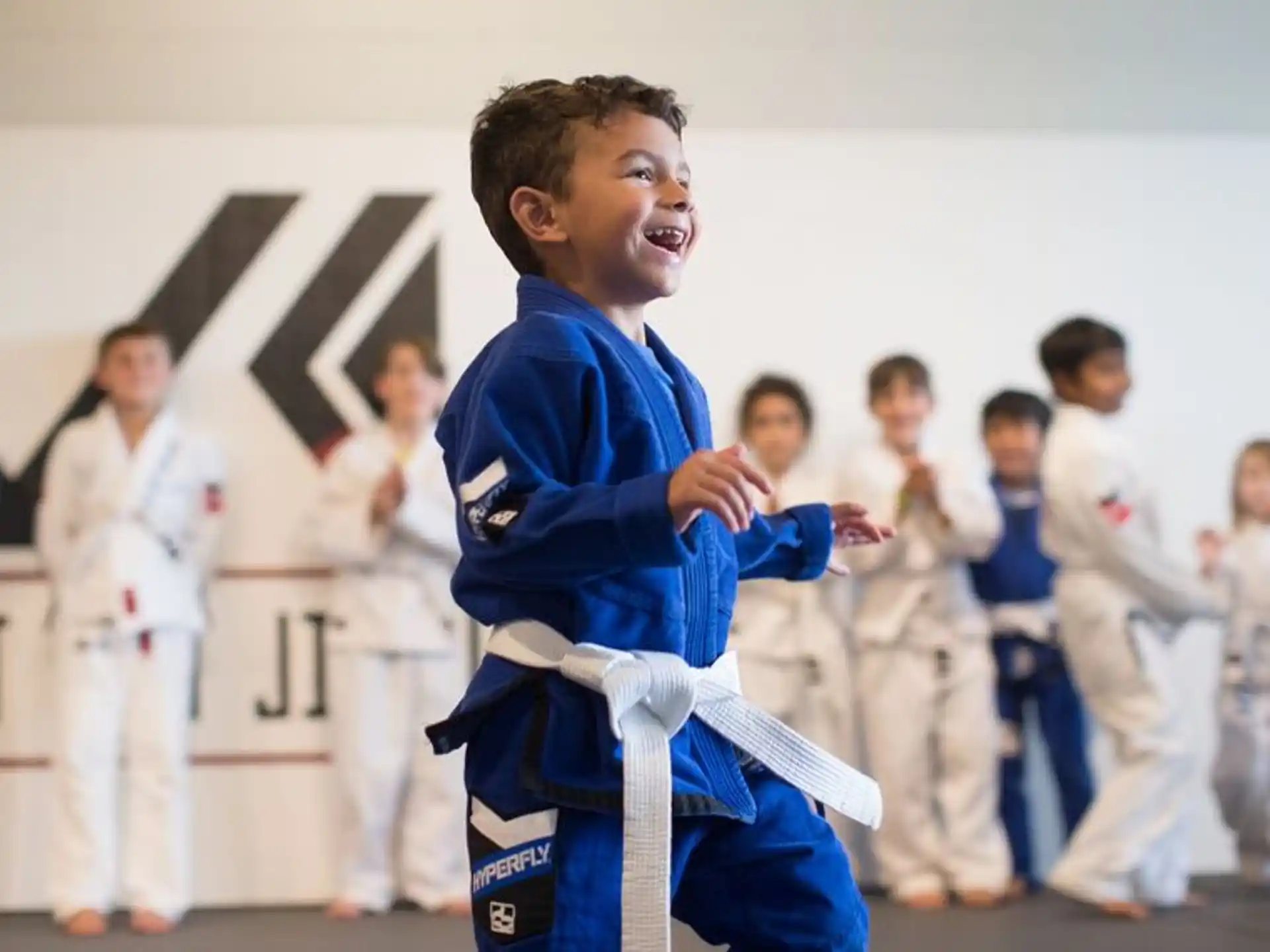 a boy in a karate uniform