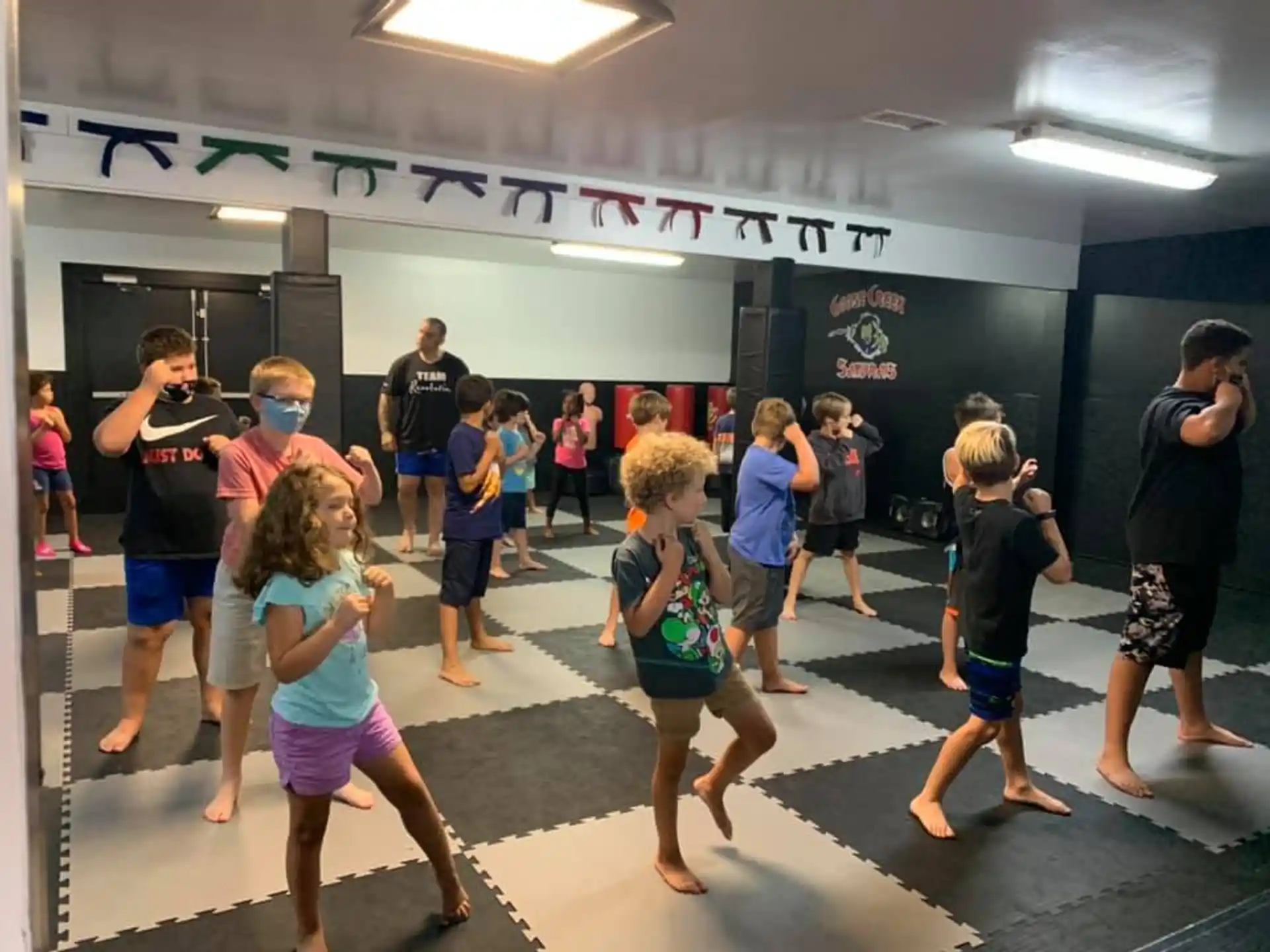 a group of people dancing in a room