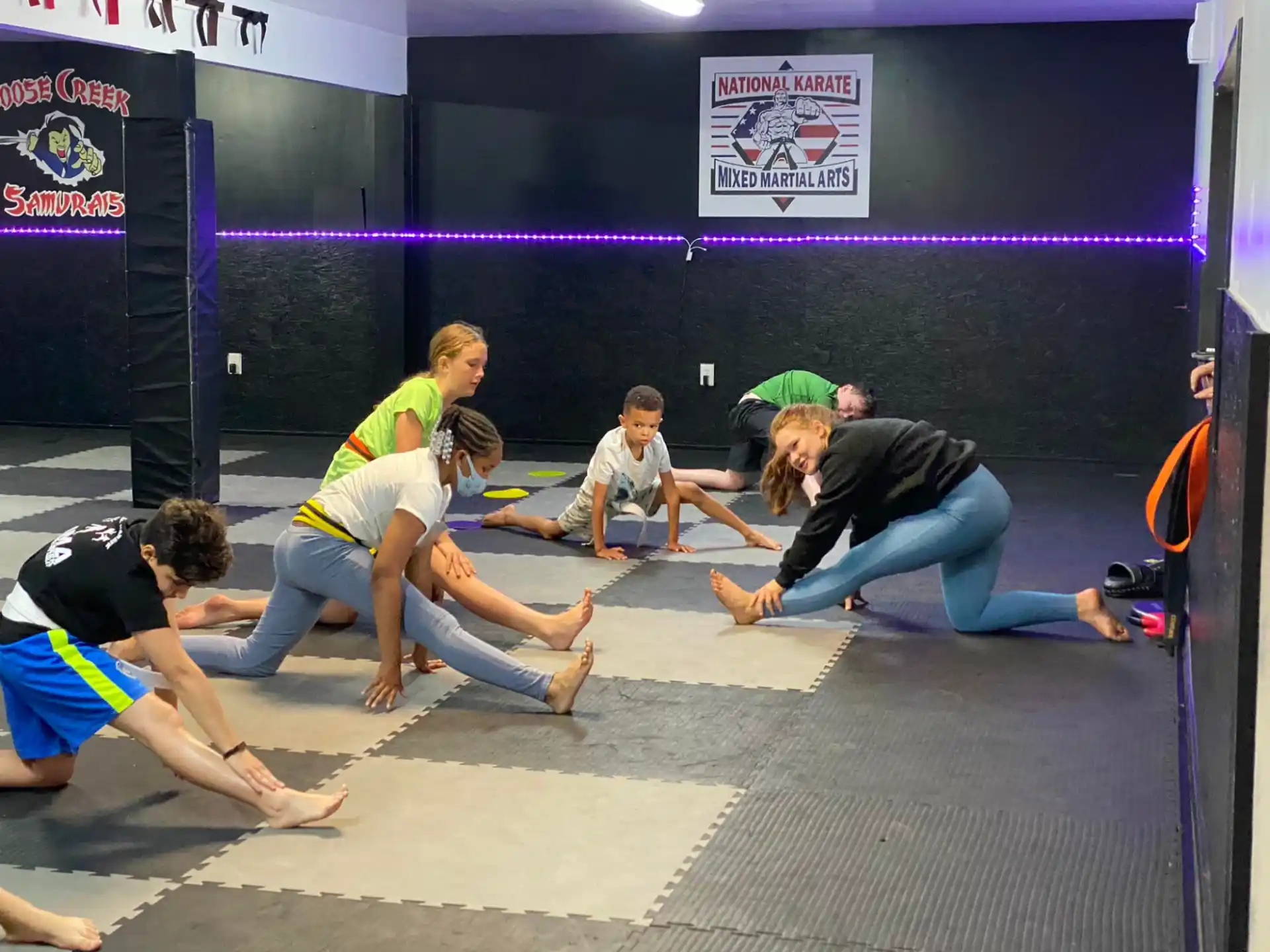 a group of people in a gym