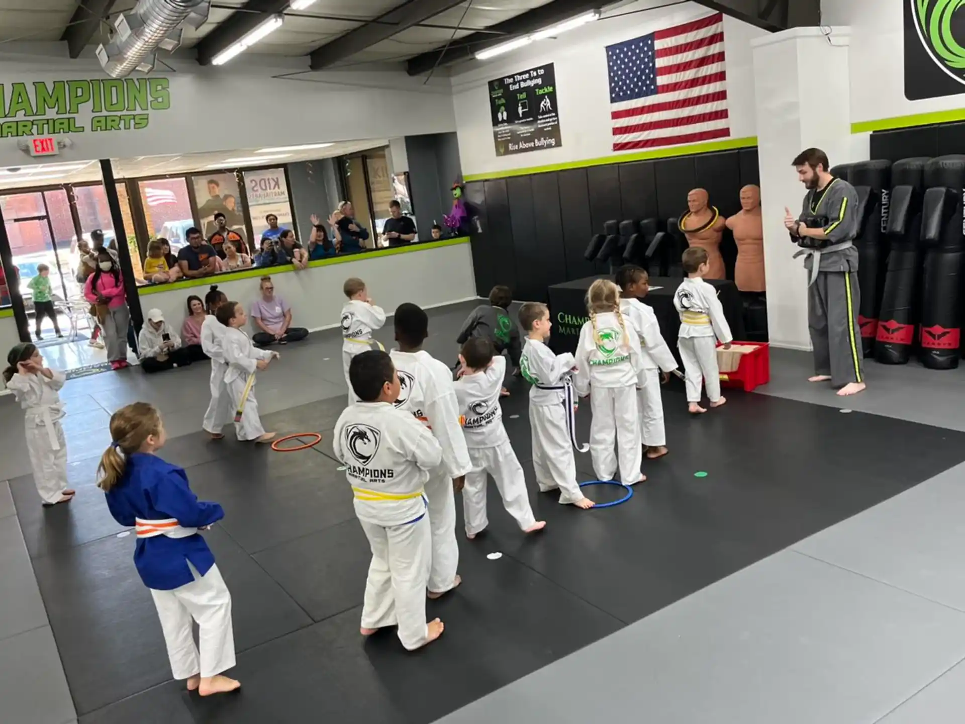 a group of people in karate uniforms