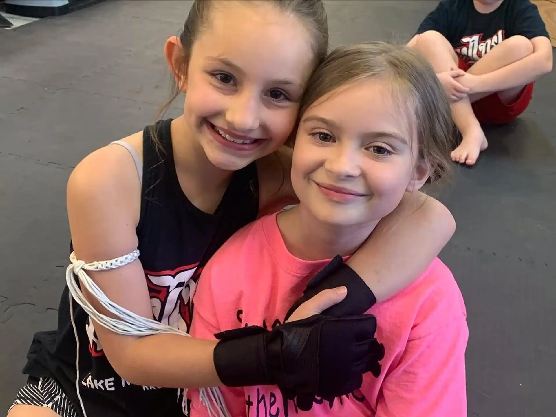 a couple girls posing for a picture