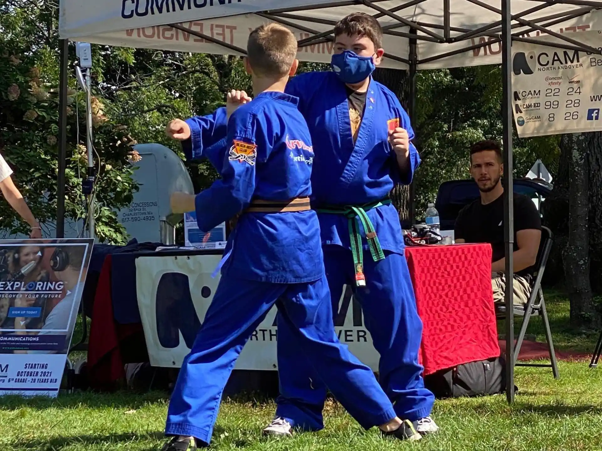 two men in blue uniforms