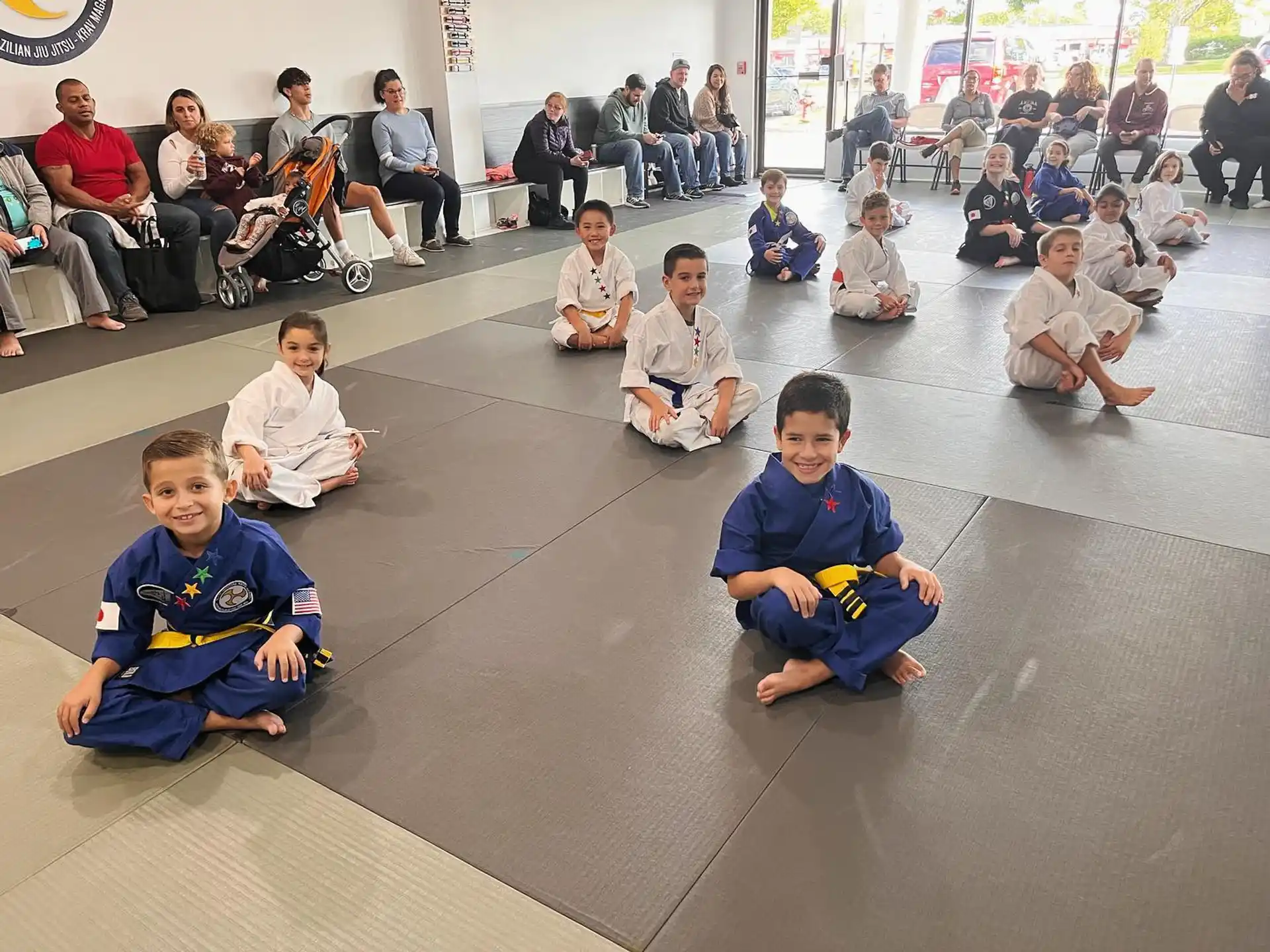 a group of people sitting on the floor