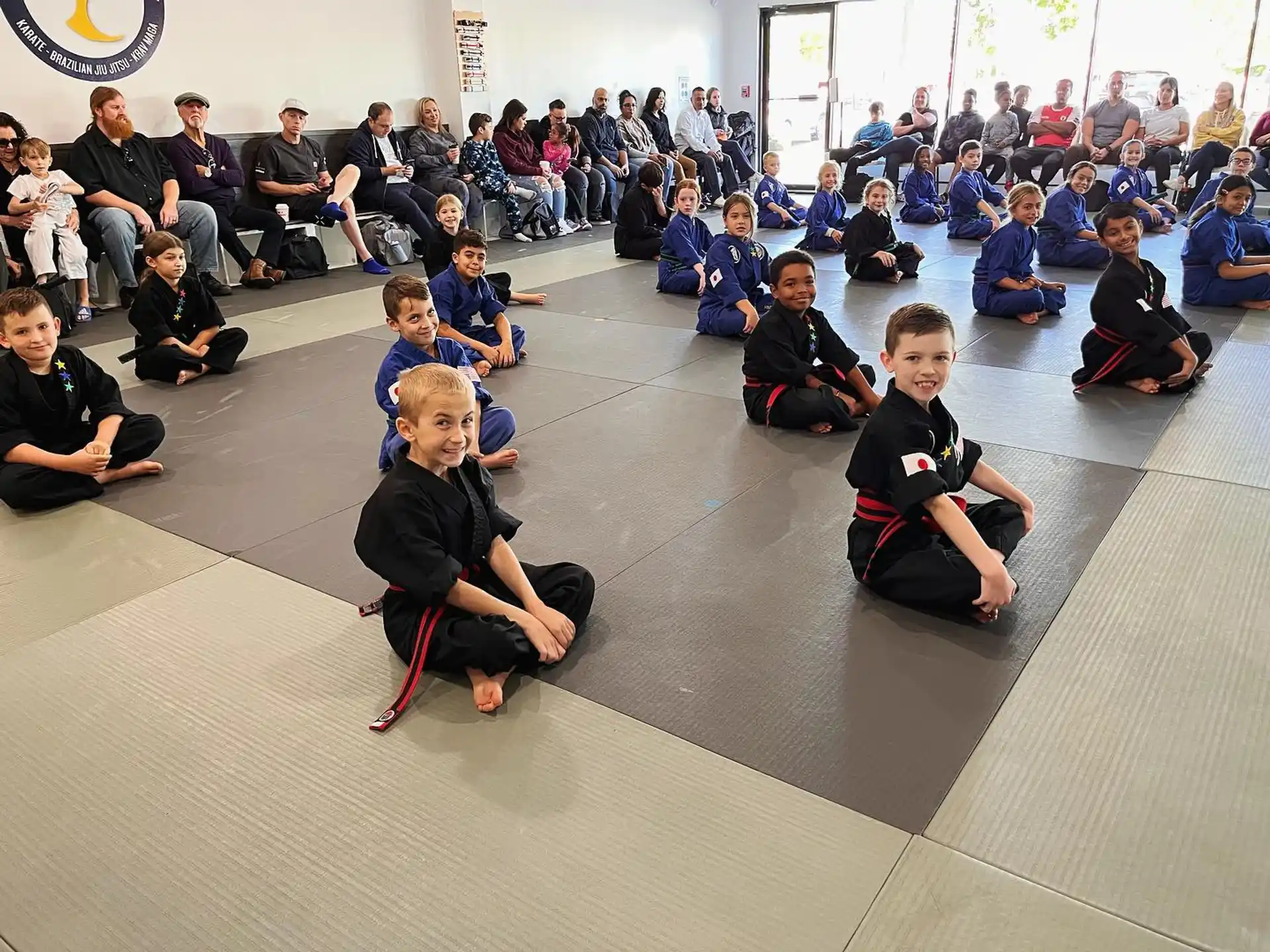 a group of people sitting on the floor