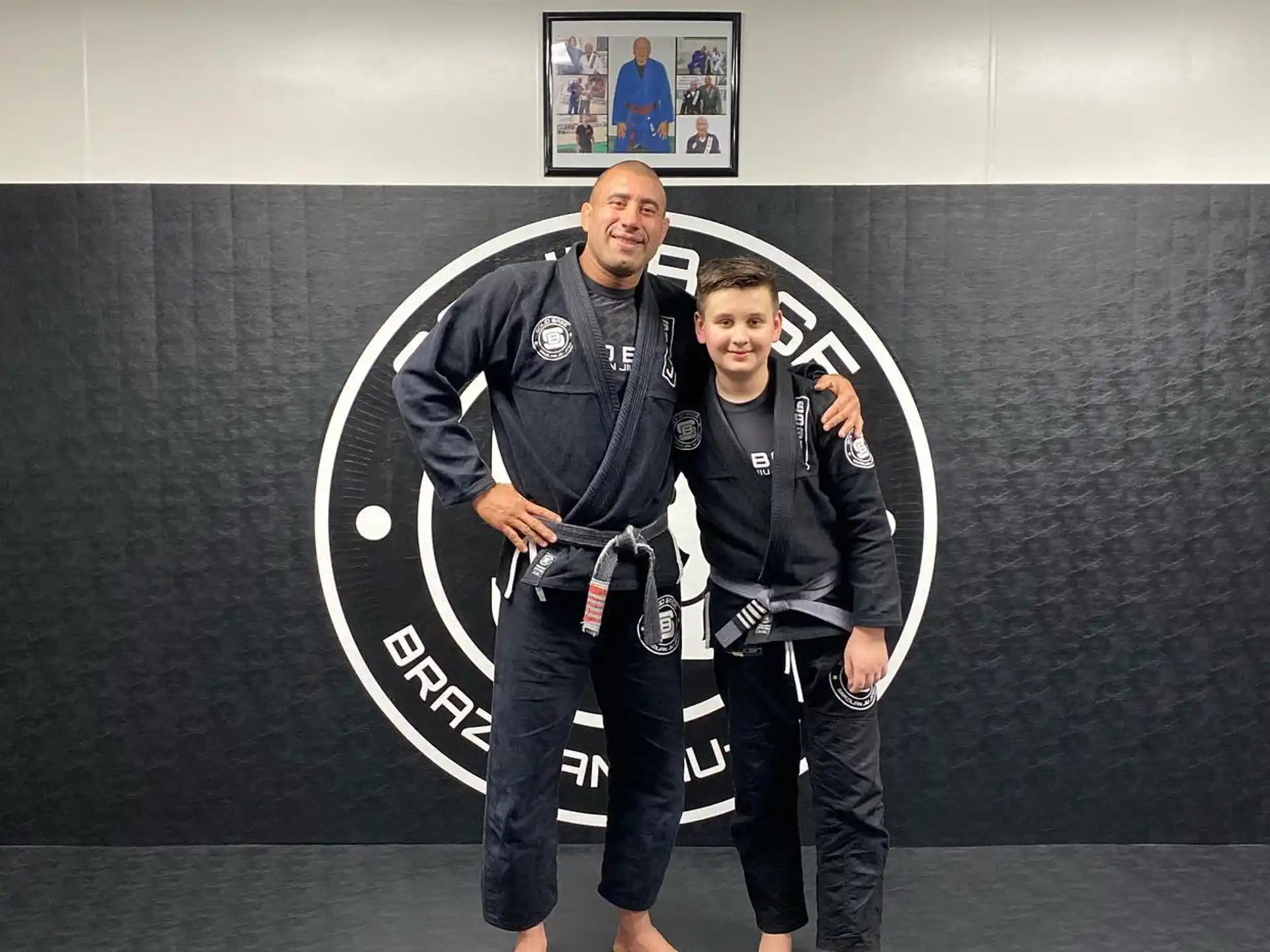 a man and a boy posing for a picture