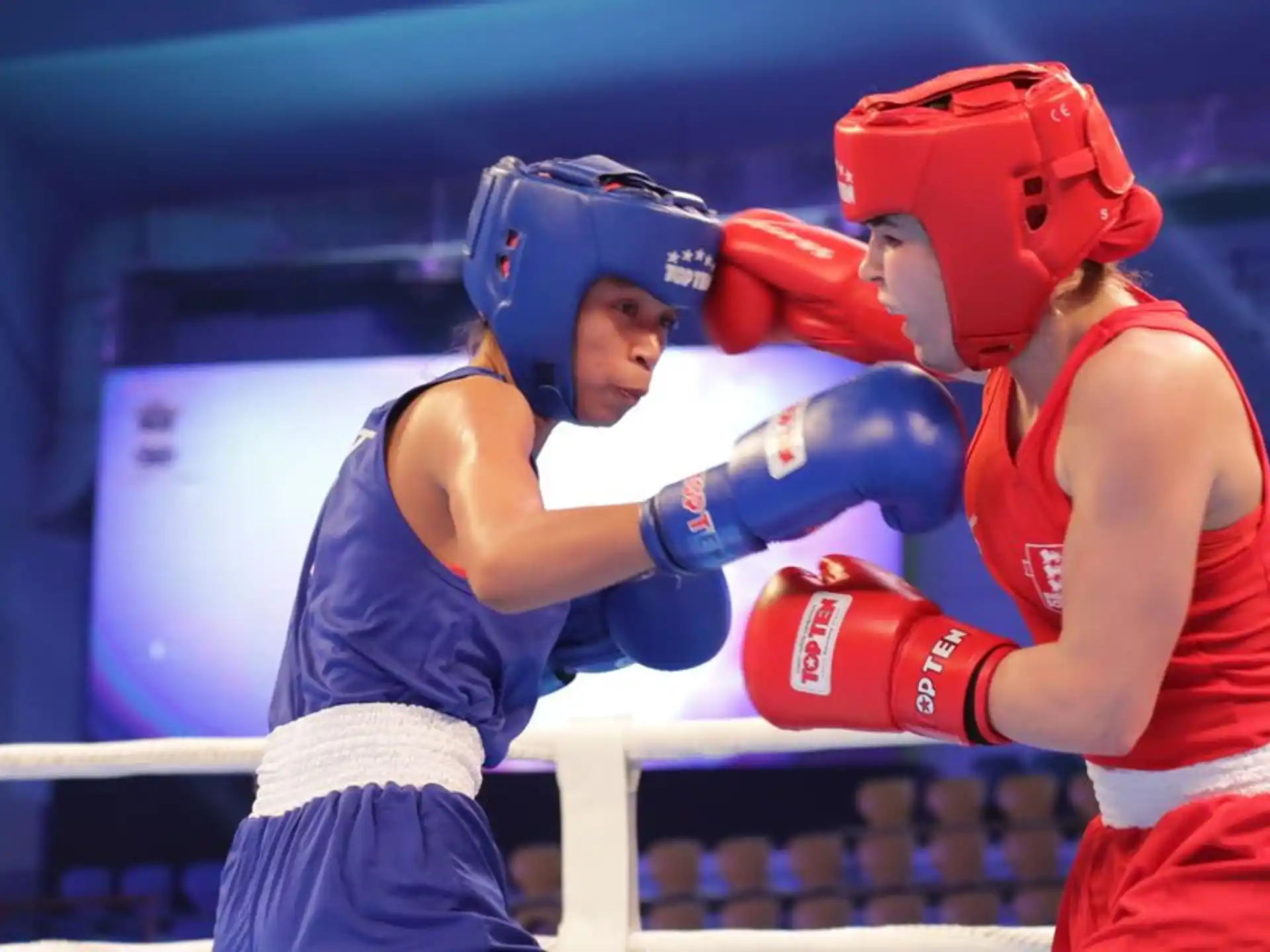 two women wearing boxing gloves