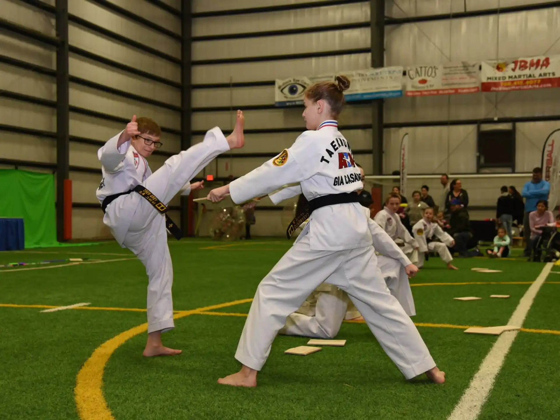 two people in karate uniforms