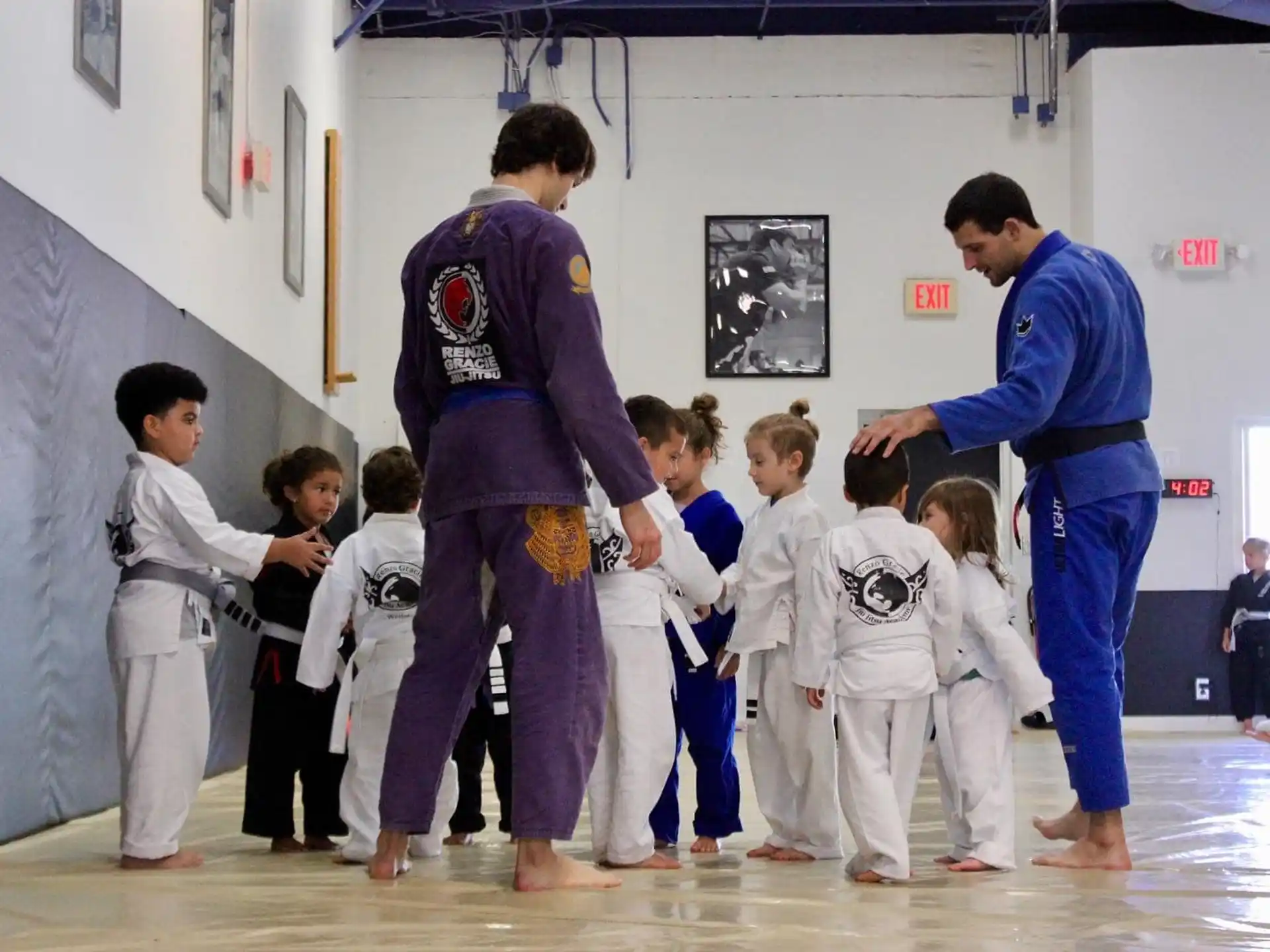a group of people in karate uniforms