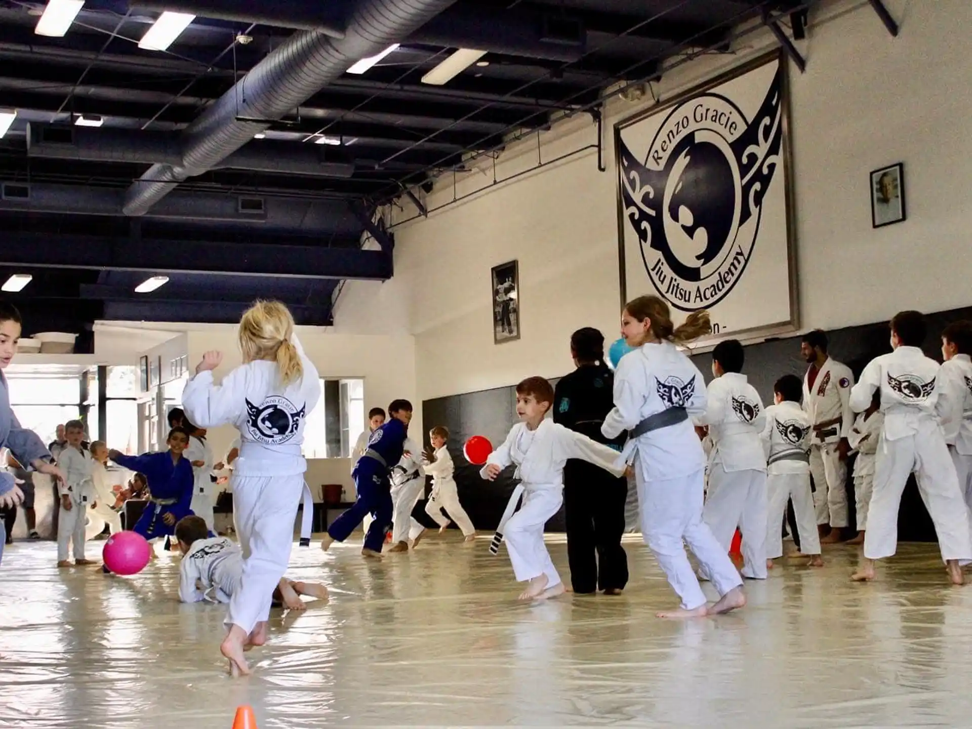 a group of people in karate uniforms