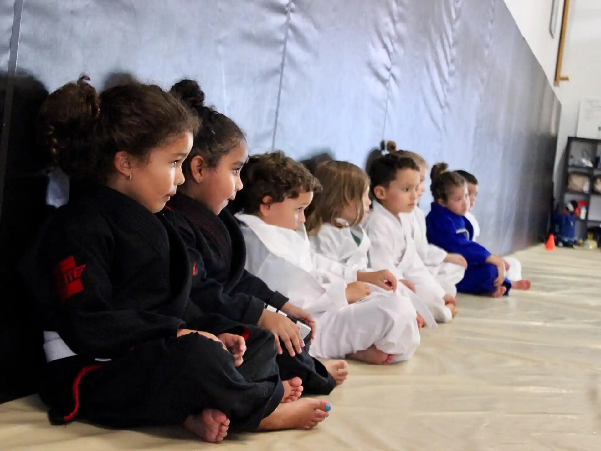 a group of people sitting on the floor