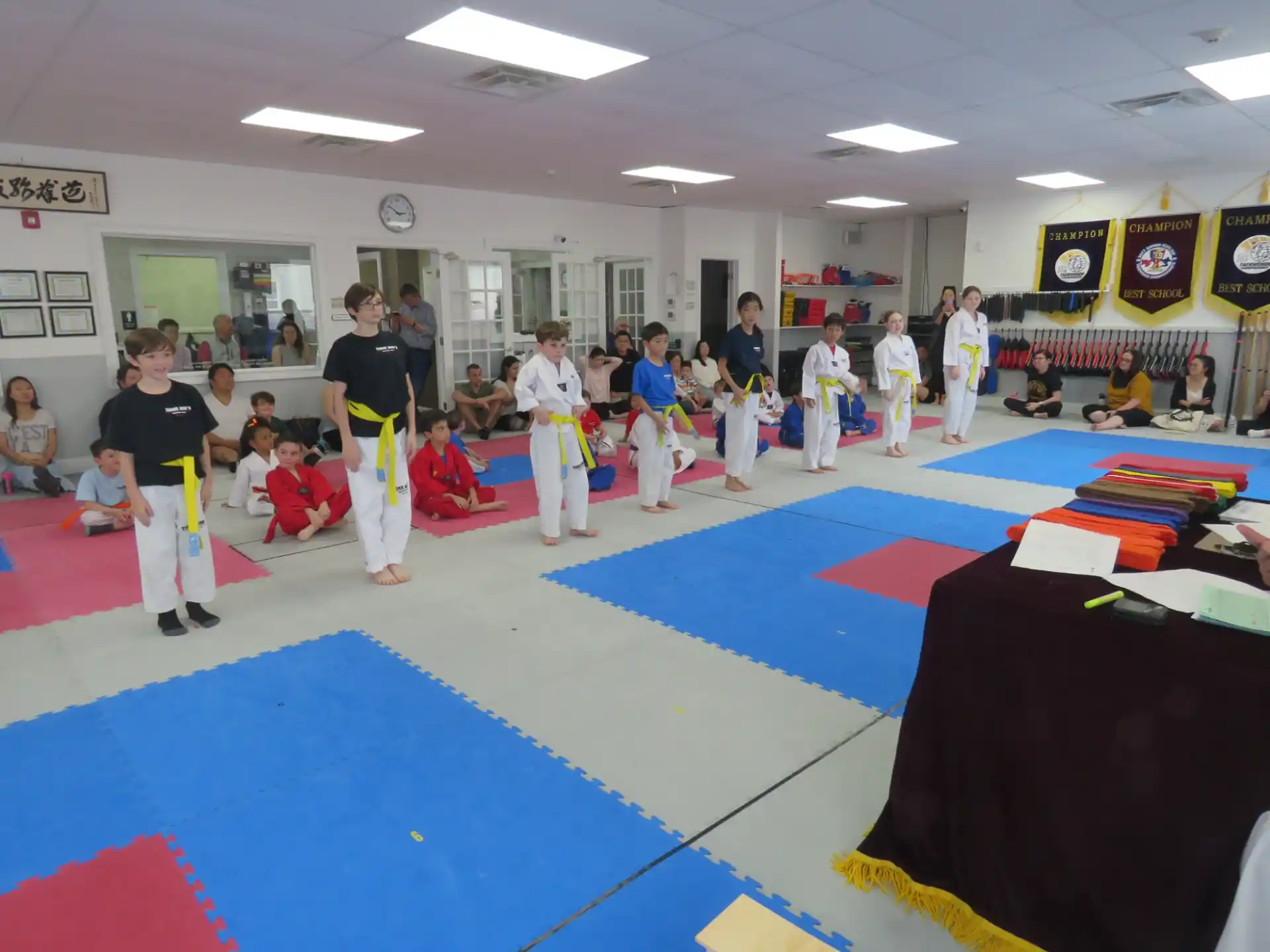 a group of people in karate uniforms
