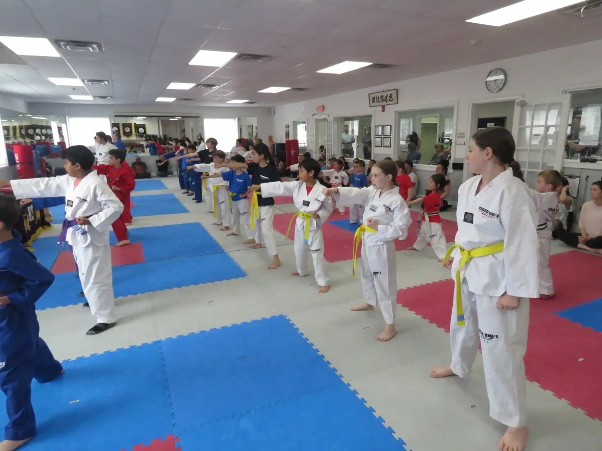 a group of people in karate uniforms
