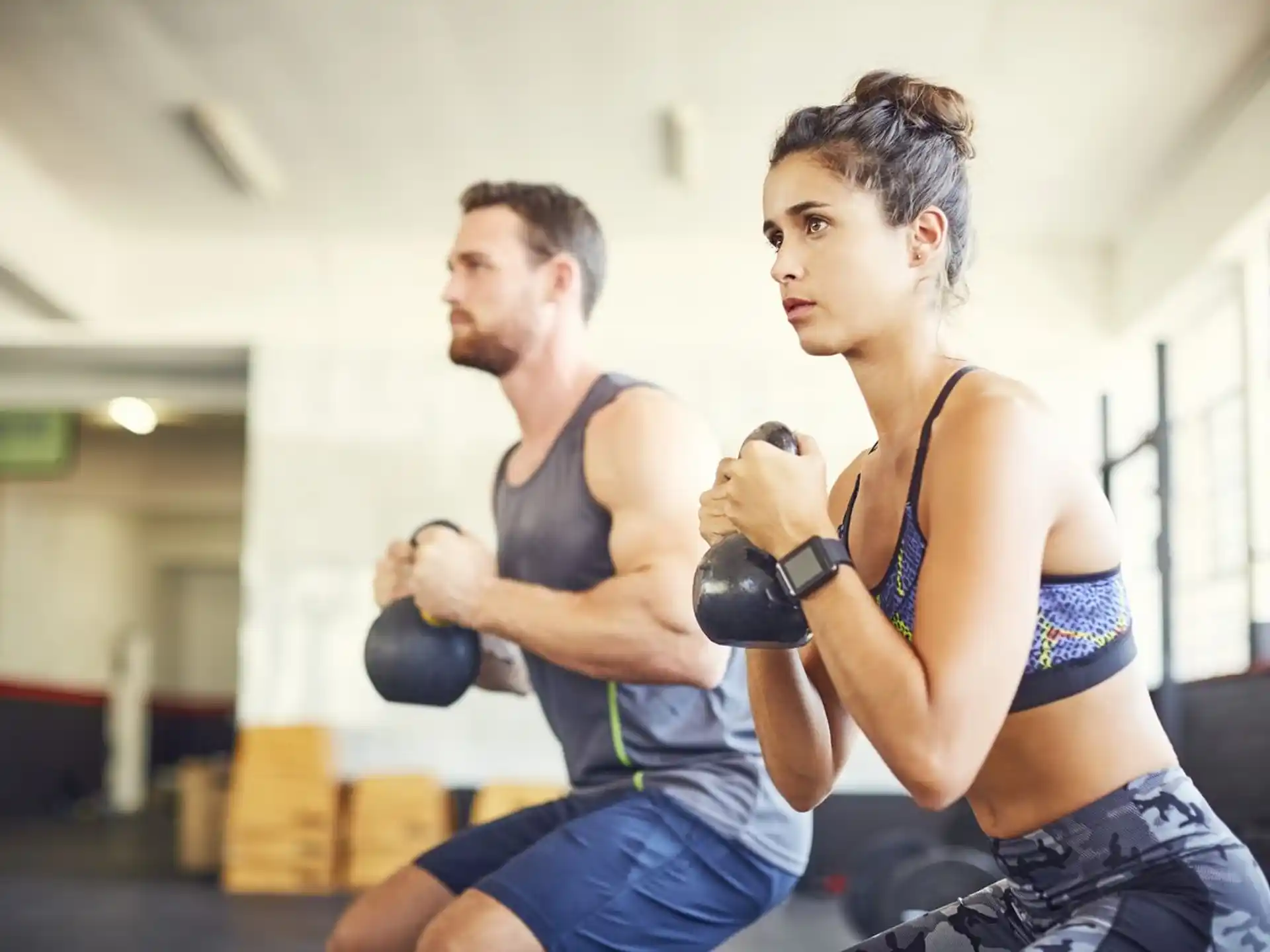 a man and a woman exercising