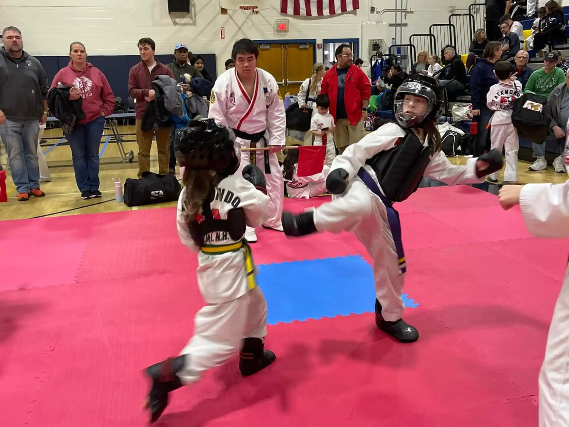 a couple of kids playing a sport