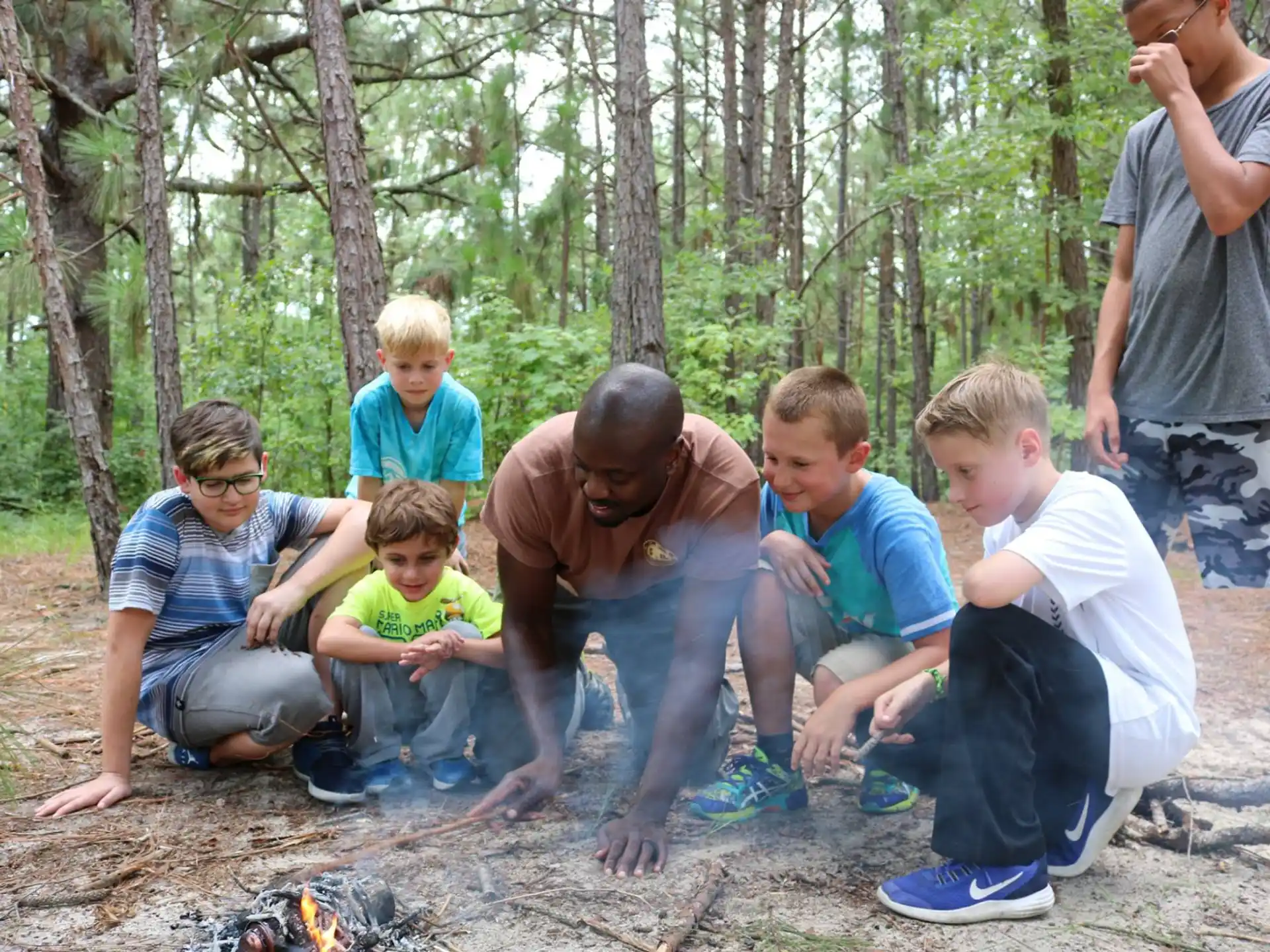 a group of people in the woods
