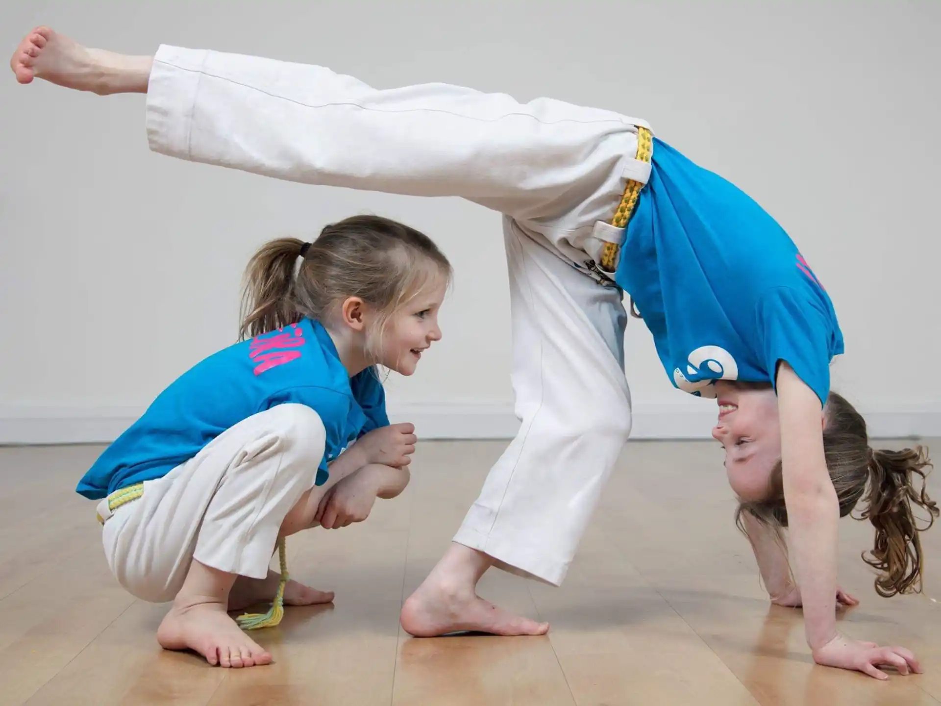 a group of children doing yoga