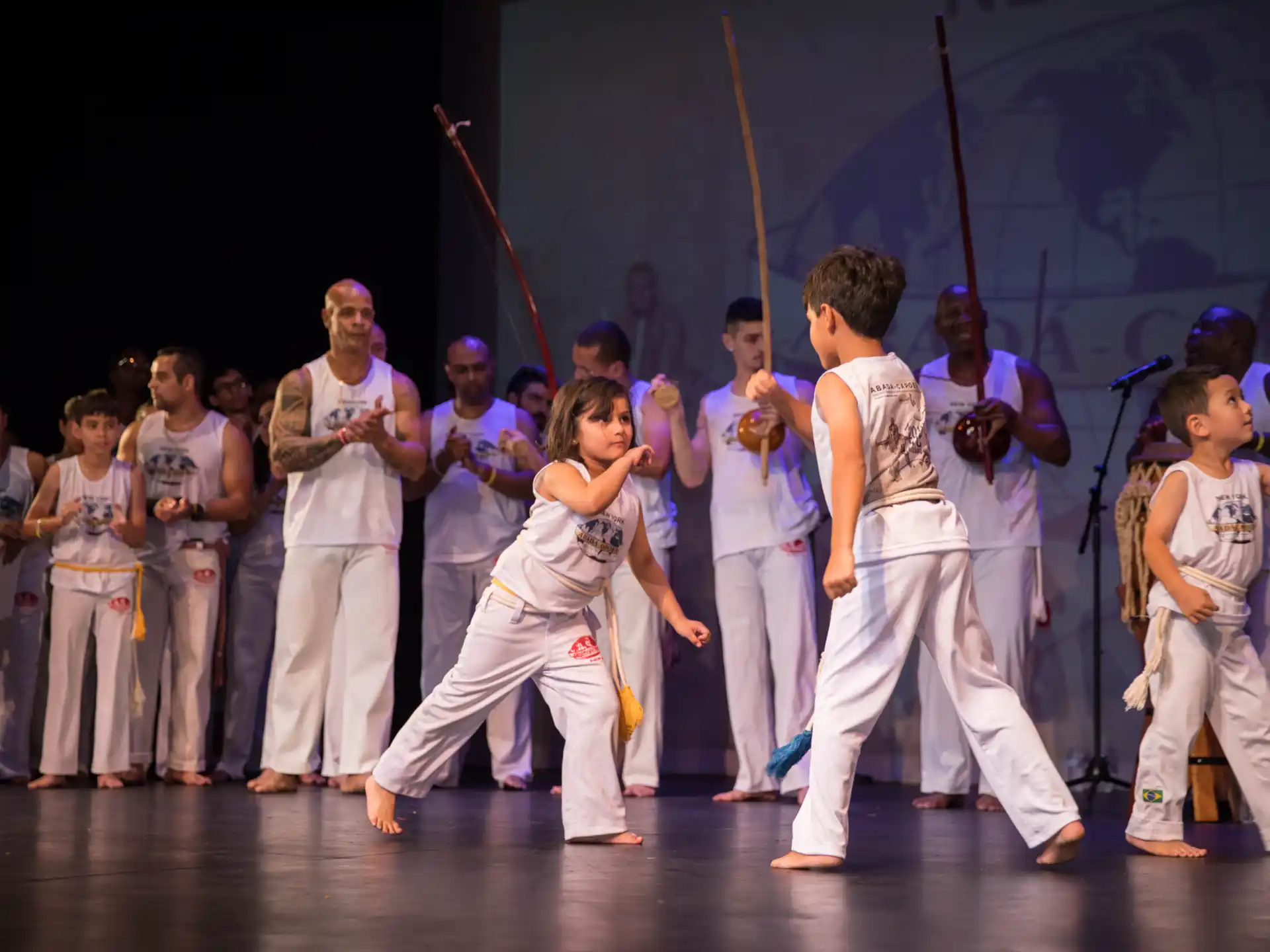 a group of people performing on stage