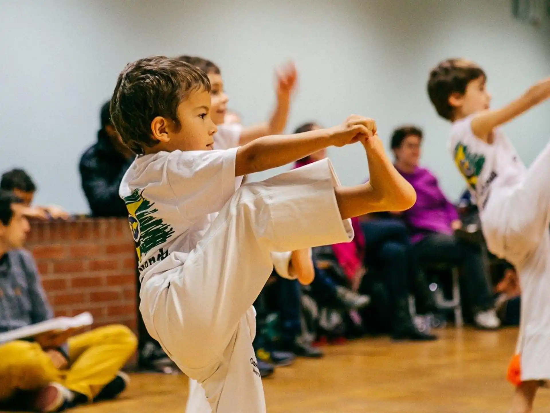 a young boy in a karate uniform
