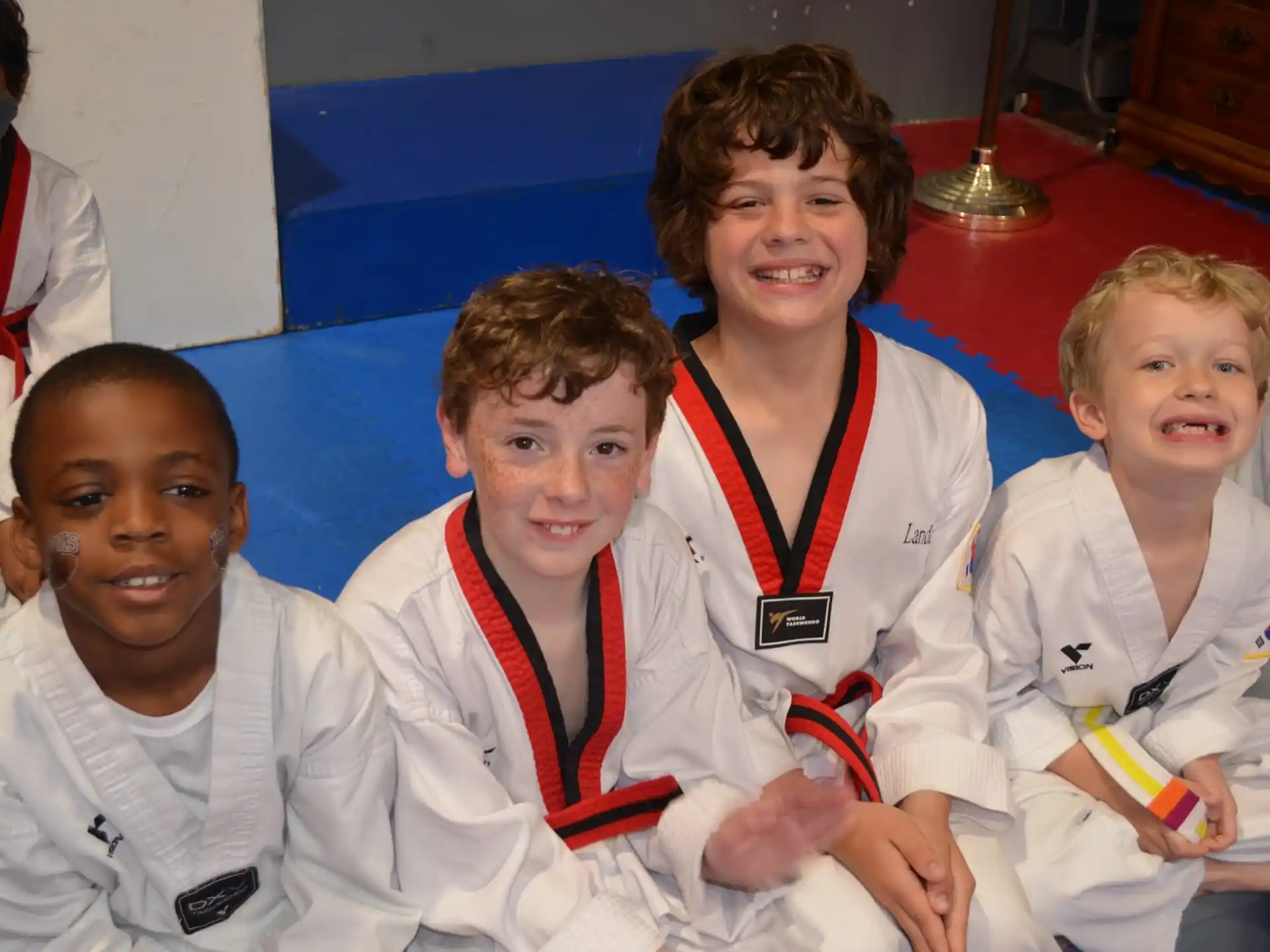 a group of people wearing white uniforms
