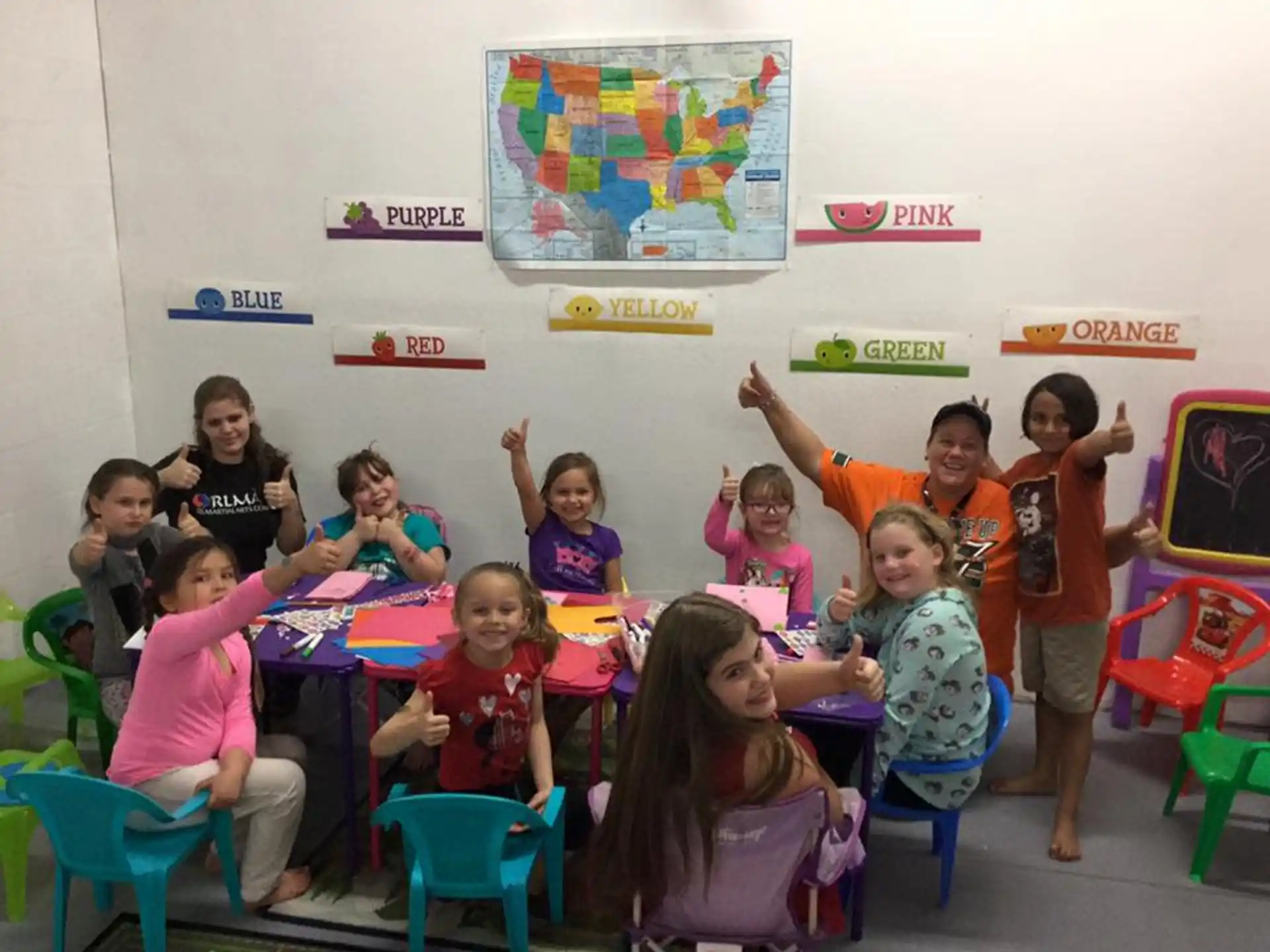 a group of children posing for a photo