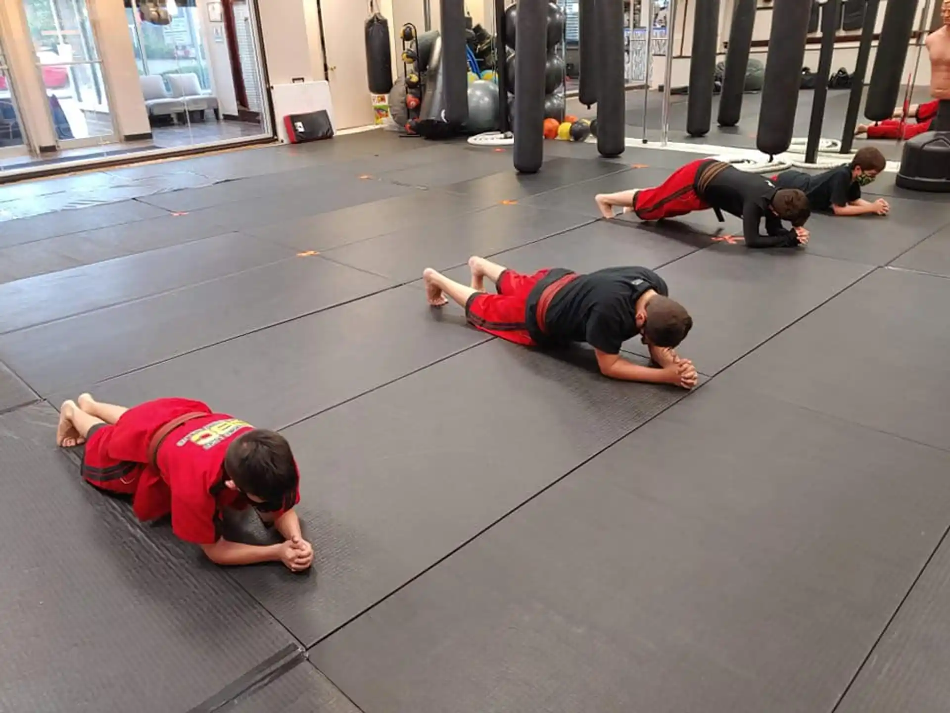 a group of boys lying on the floor