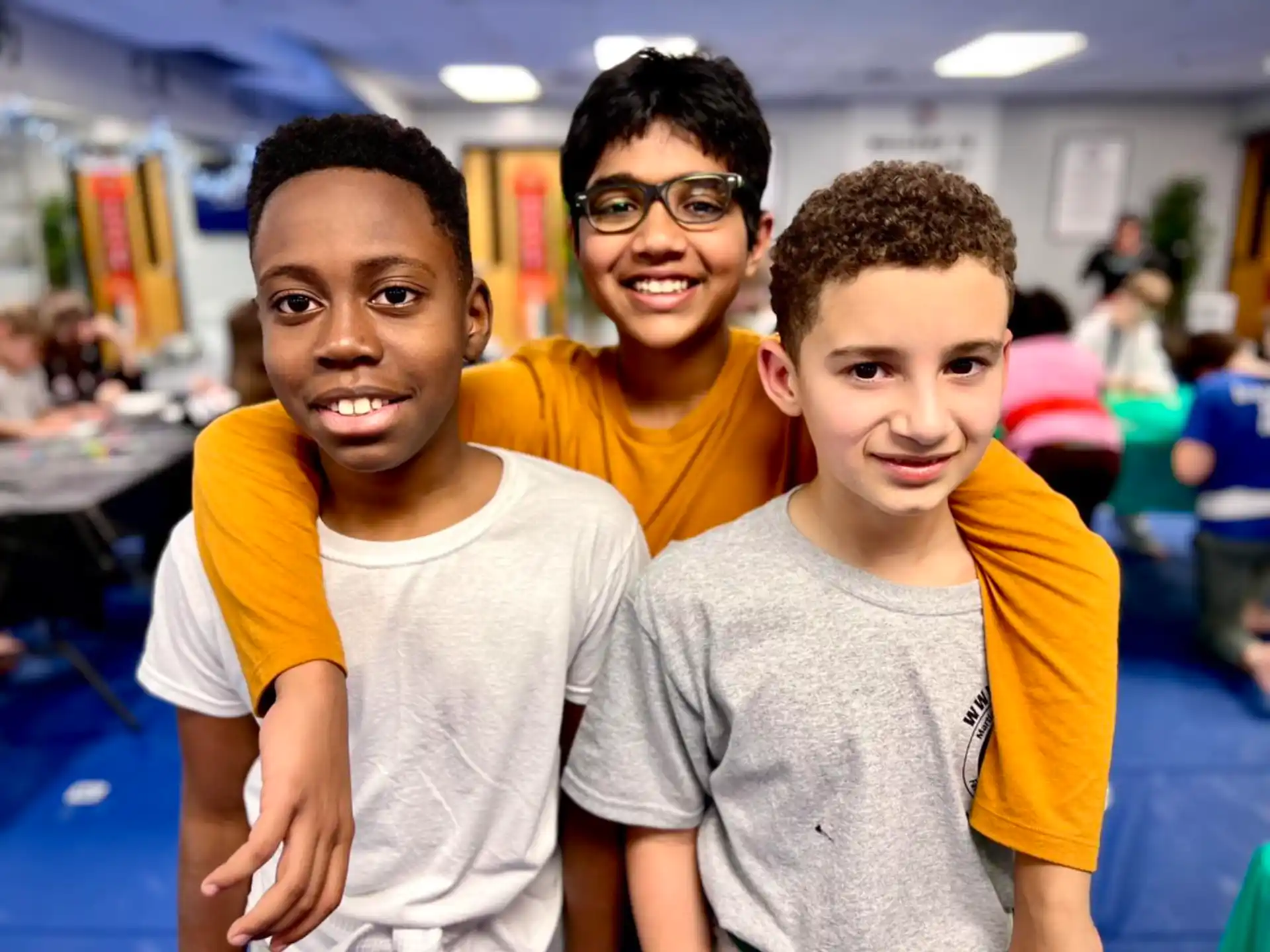 a group of boys posing for a picture