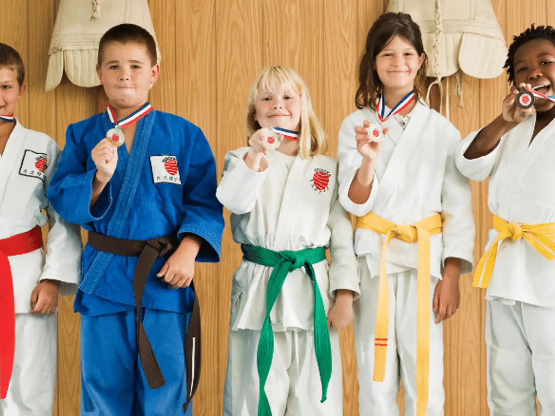a group of kids wearing clothing