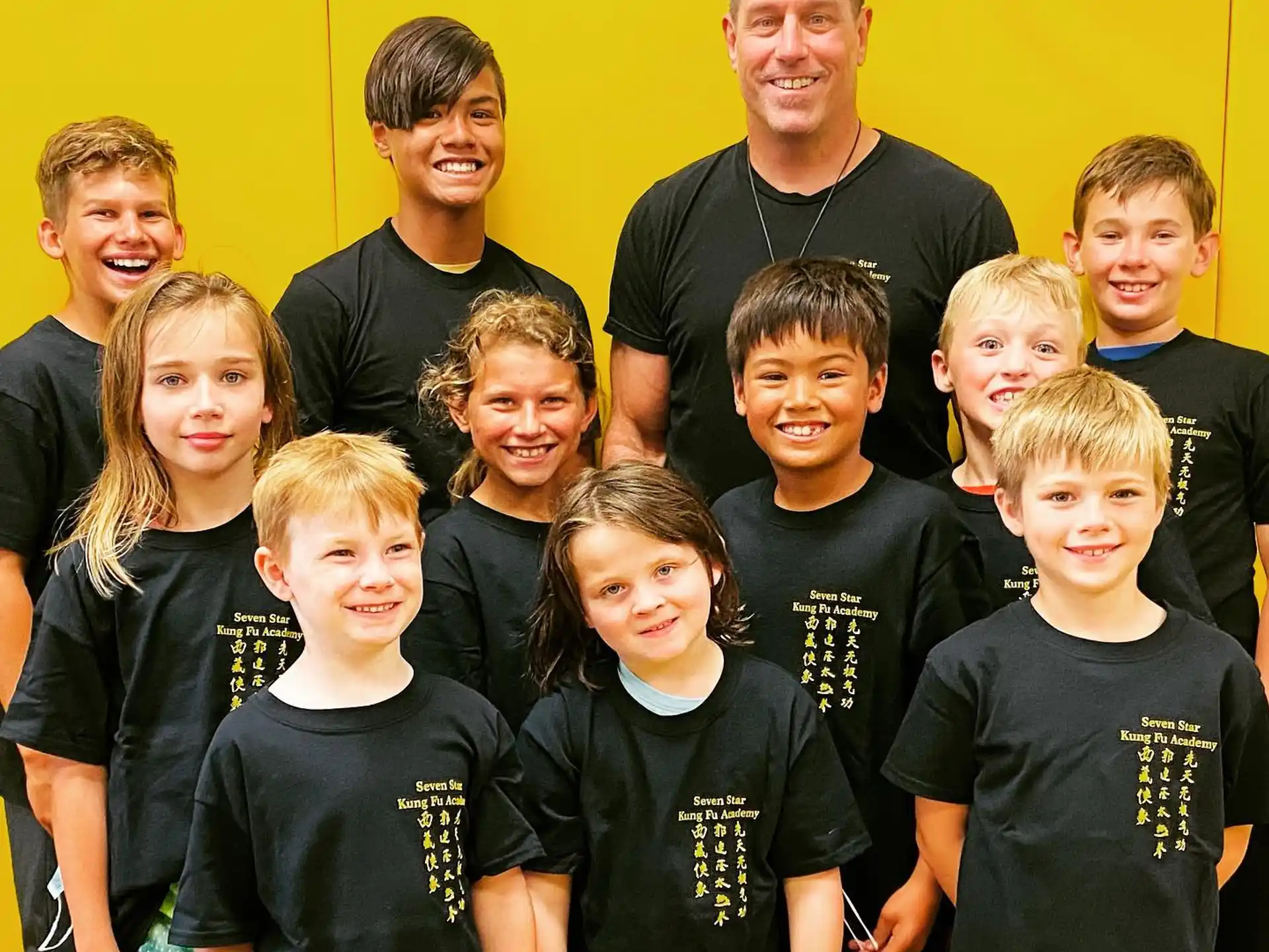 a group of people posing for a photo