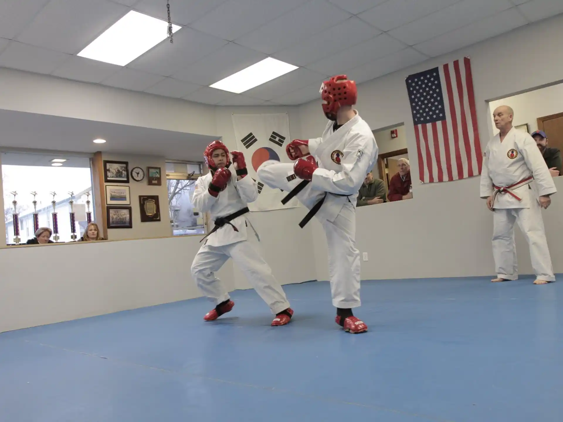 a group of people in white uniforms