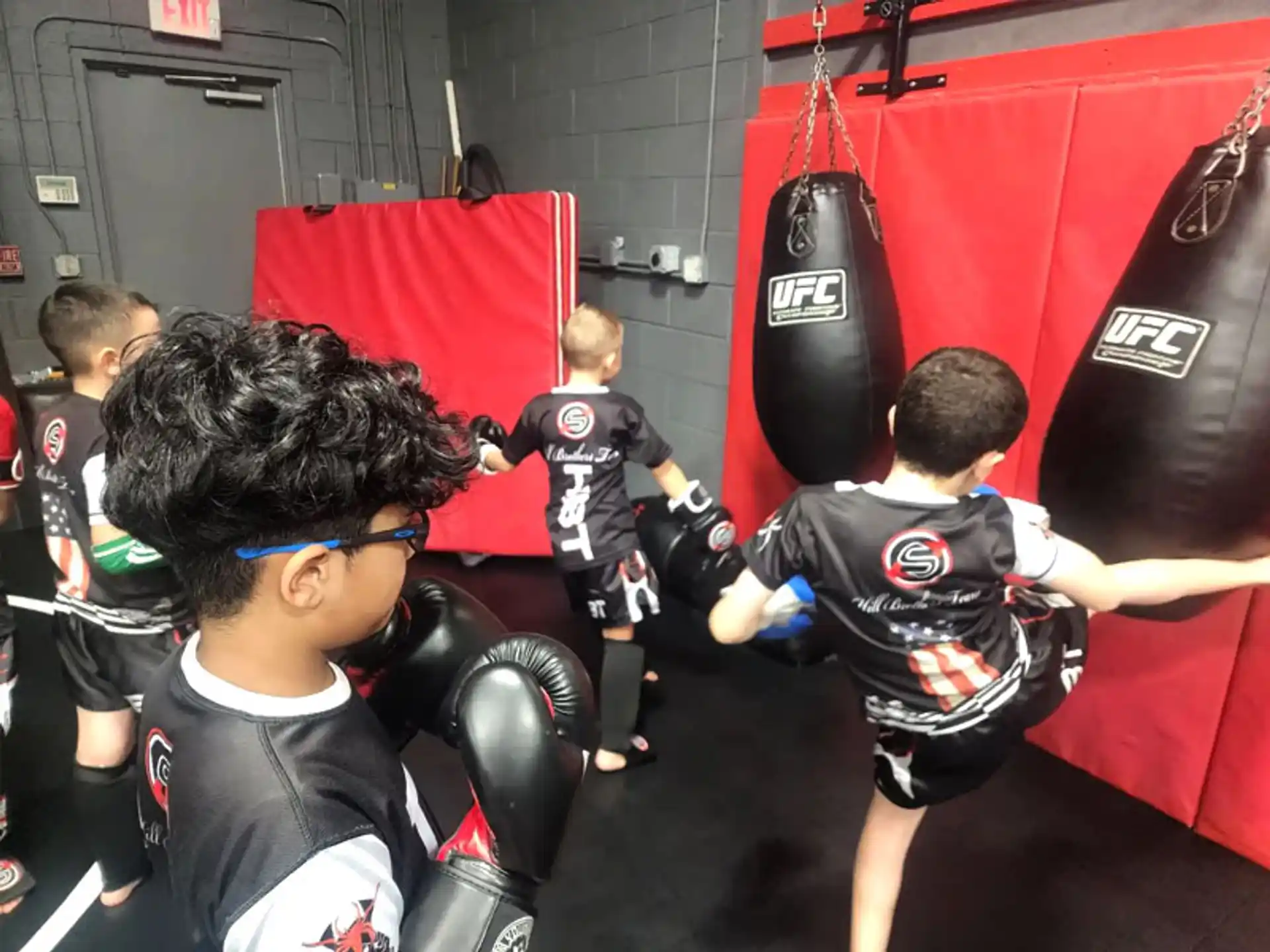 a group of boys in a gym