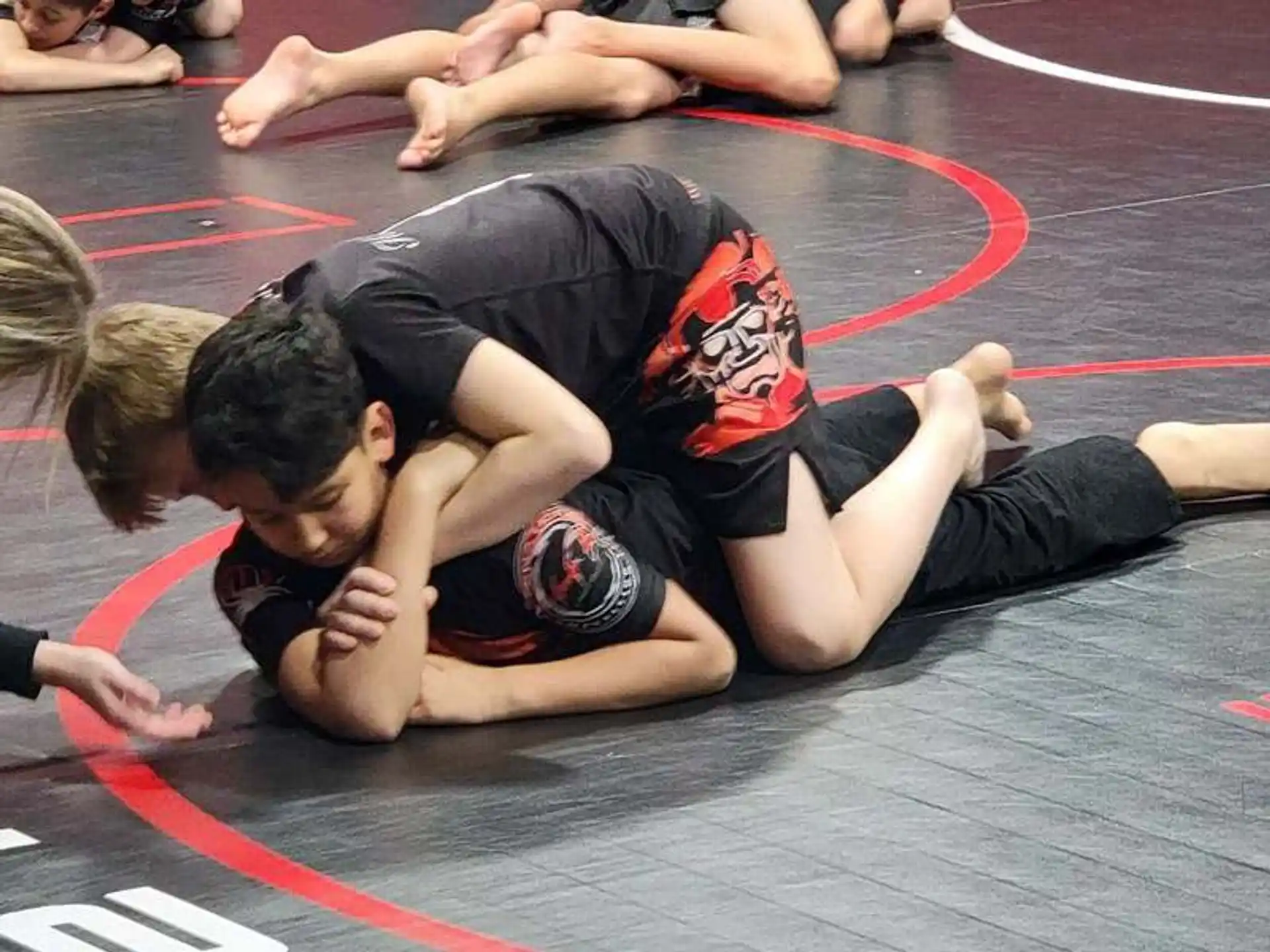 a group of people wrestling