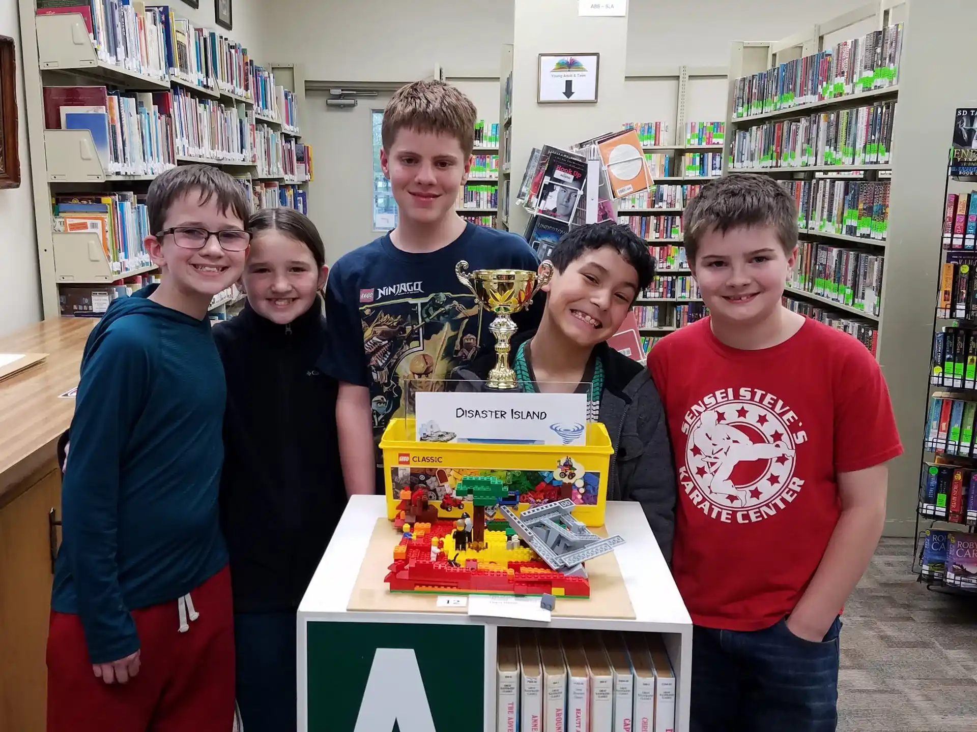 a group of boys posing for a picture