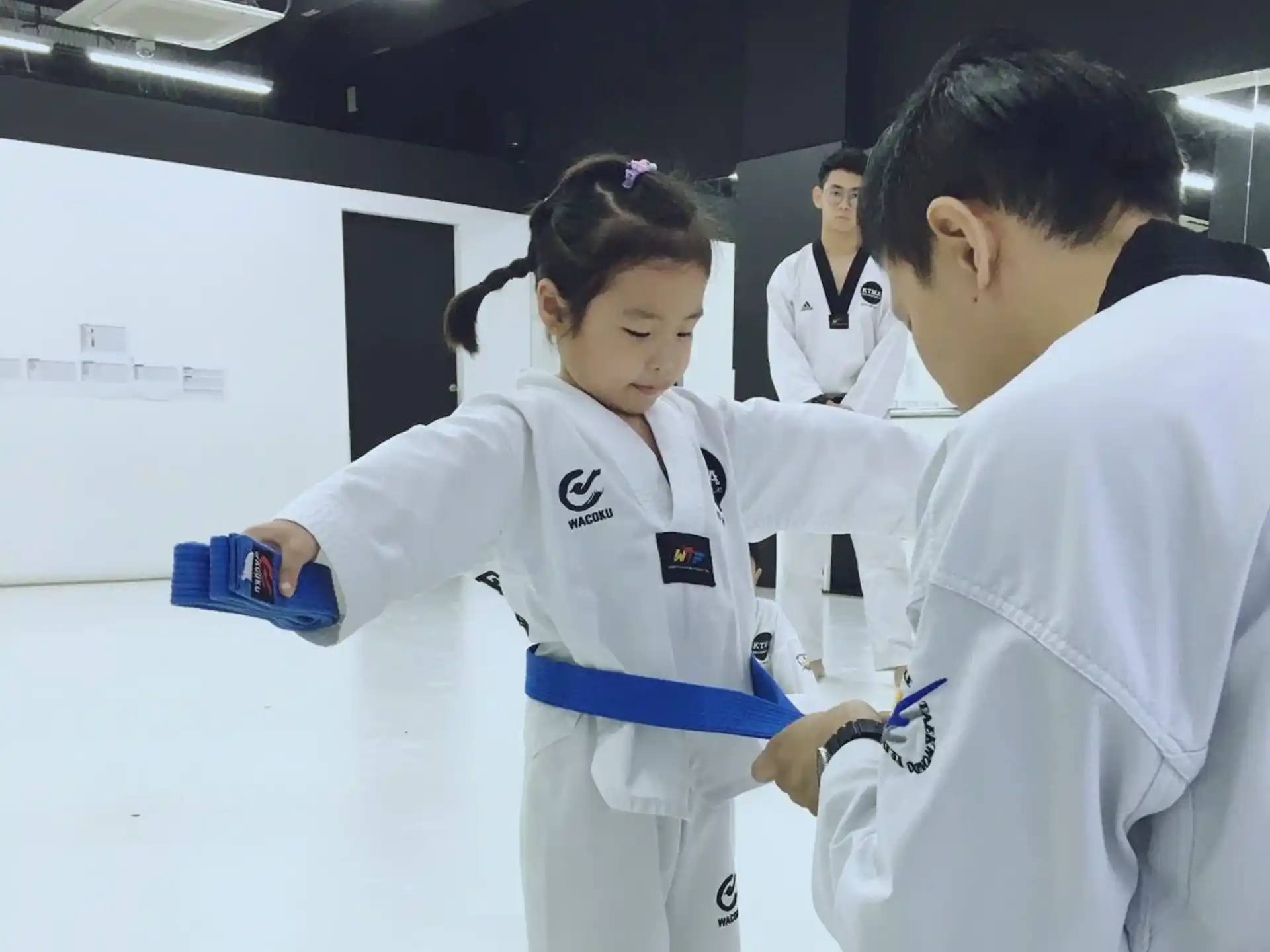a man and a woman in white lab coats