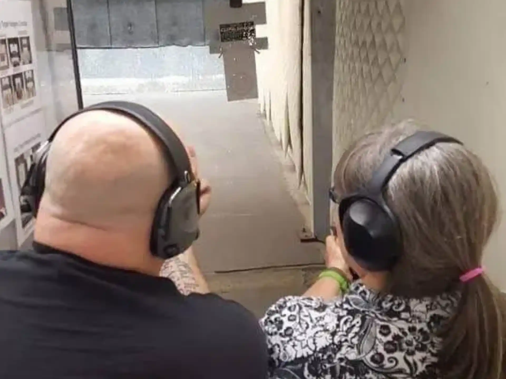 a man and woman wearing headphones