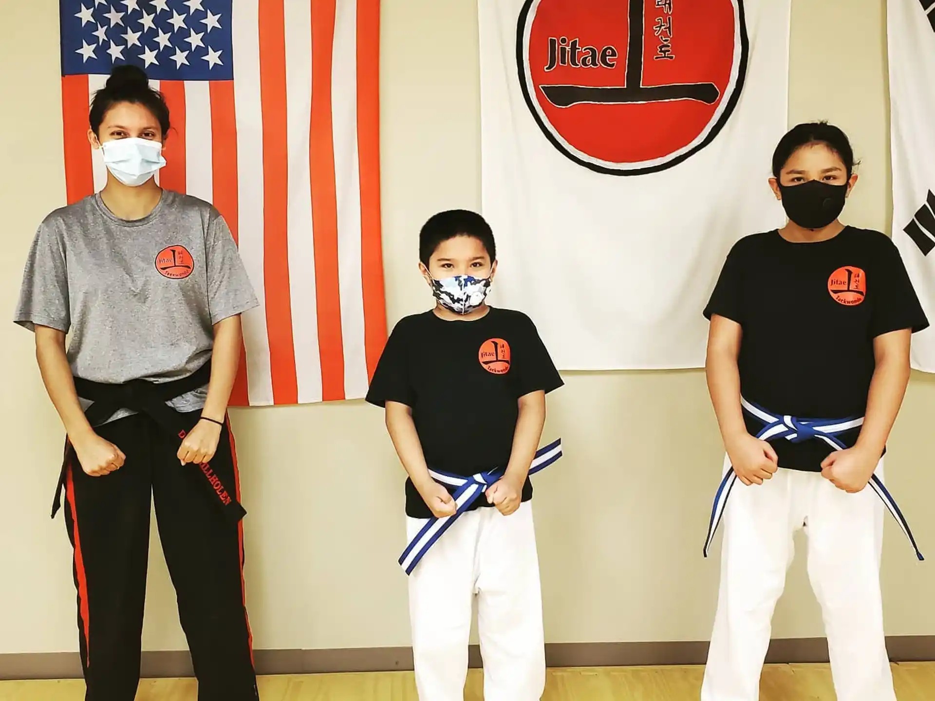 a group of people wearing masks
